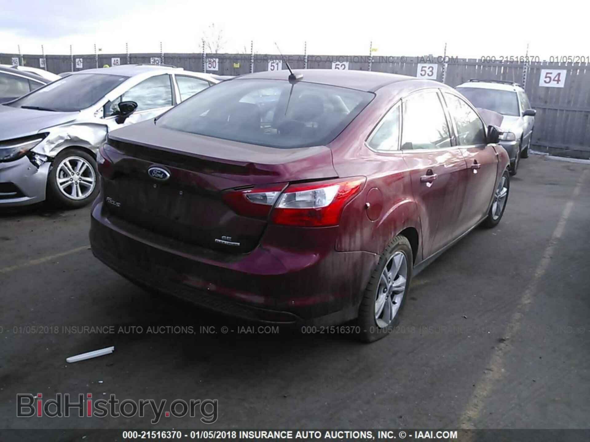 2014 Ford Focus - VIN: 1FADP3F21EL397639 - Фото 4