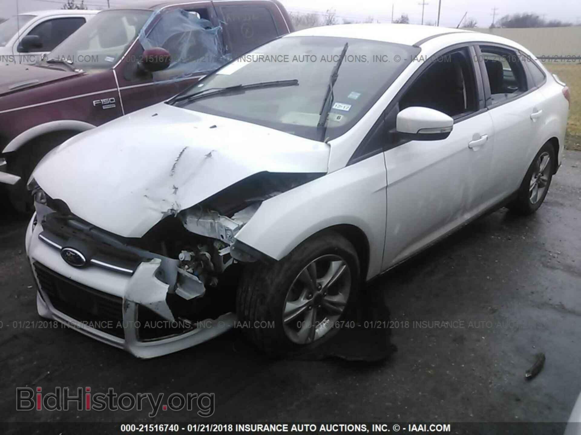 2014 Ford Focus - VIN: 1FADP3F24EL440239 - Photo 2