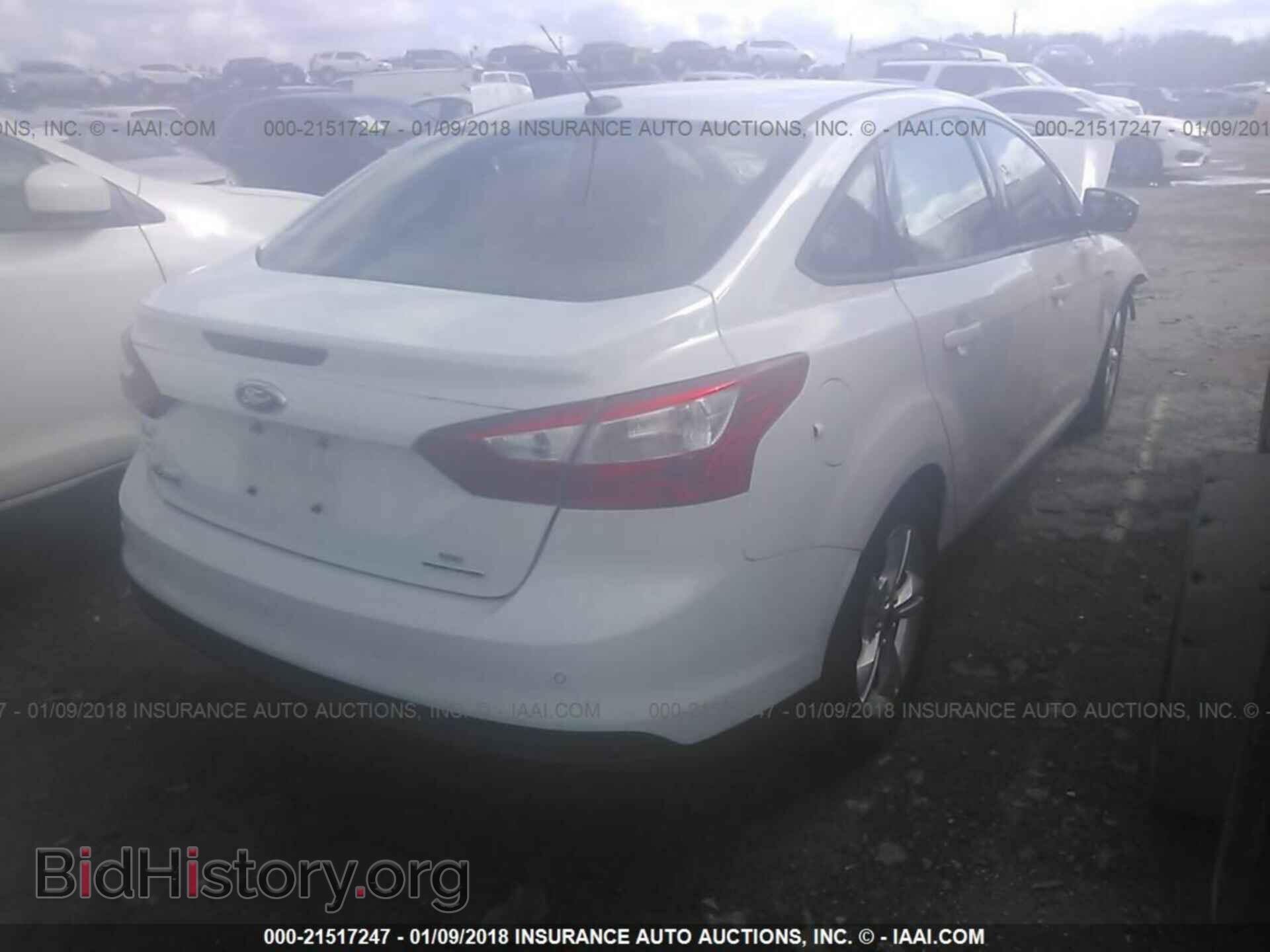 2014 Ford Focus - VIN: 1FADP3F24EL345616 - Photo 4