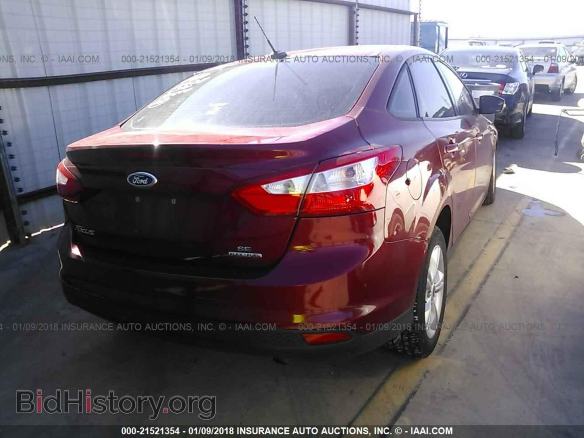2013 Ford Focus - VIN: 1FADP3F24DL318852 - Фото 4