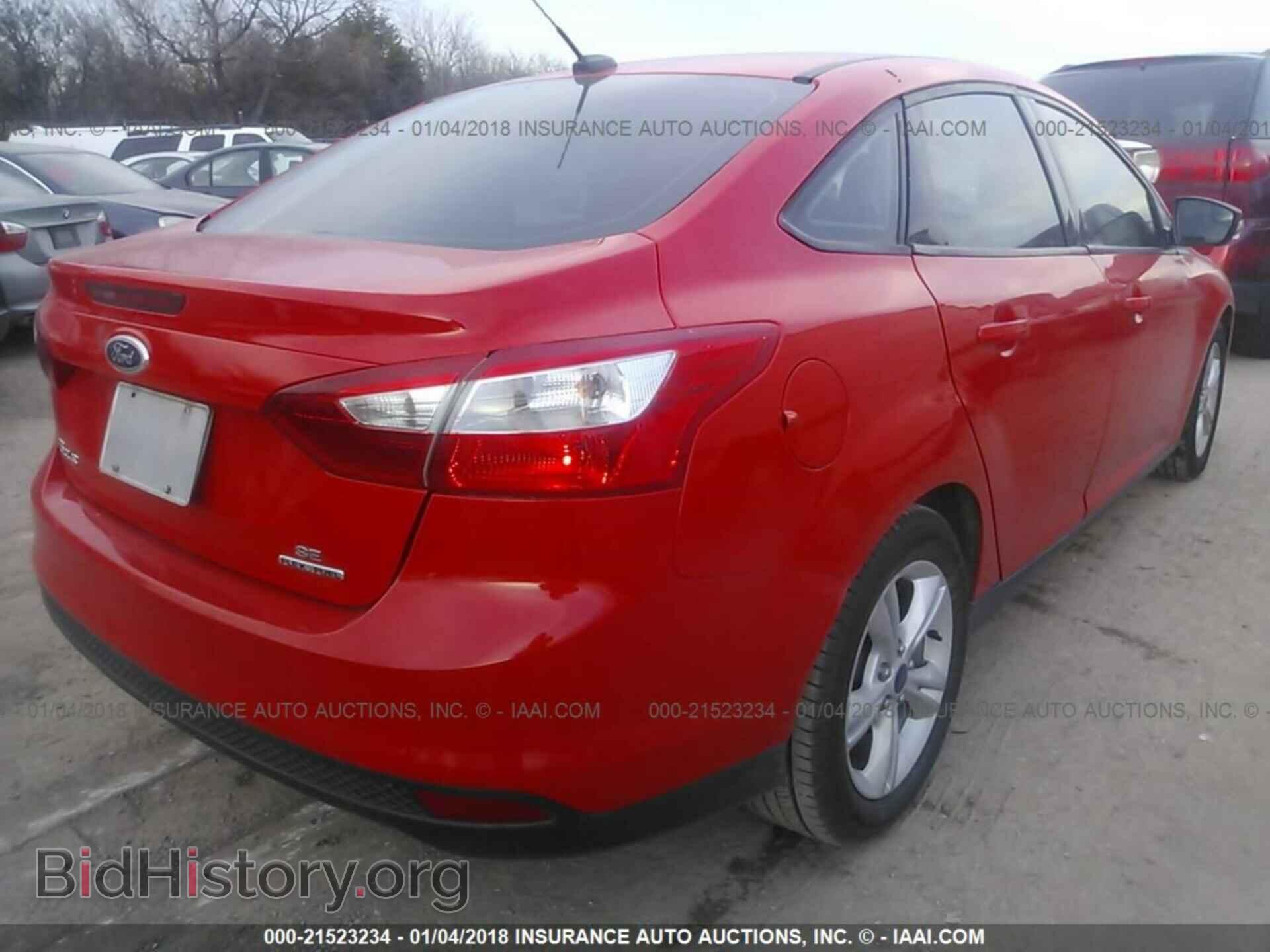 2014 Ford Focus - VIN: 1FADP3F23EL429992 - Photo 4