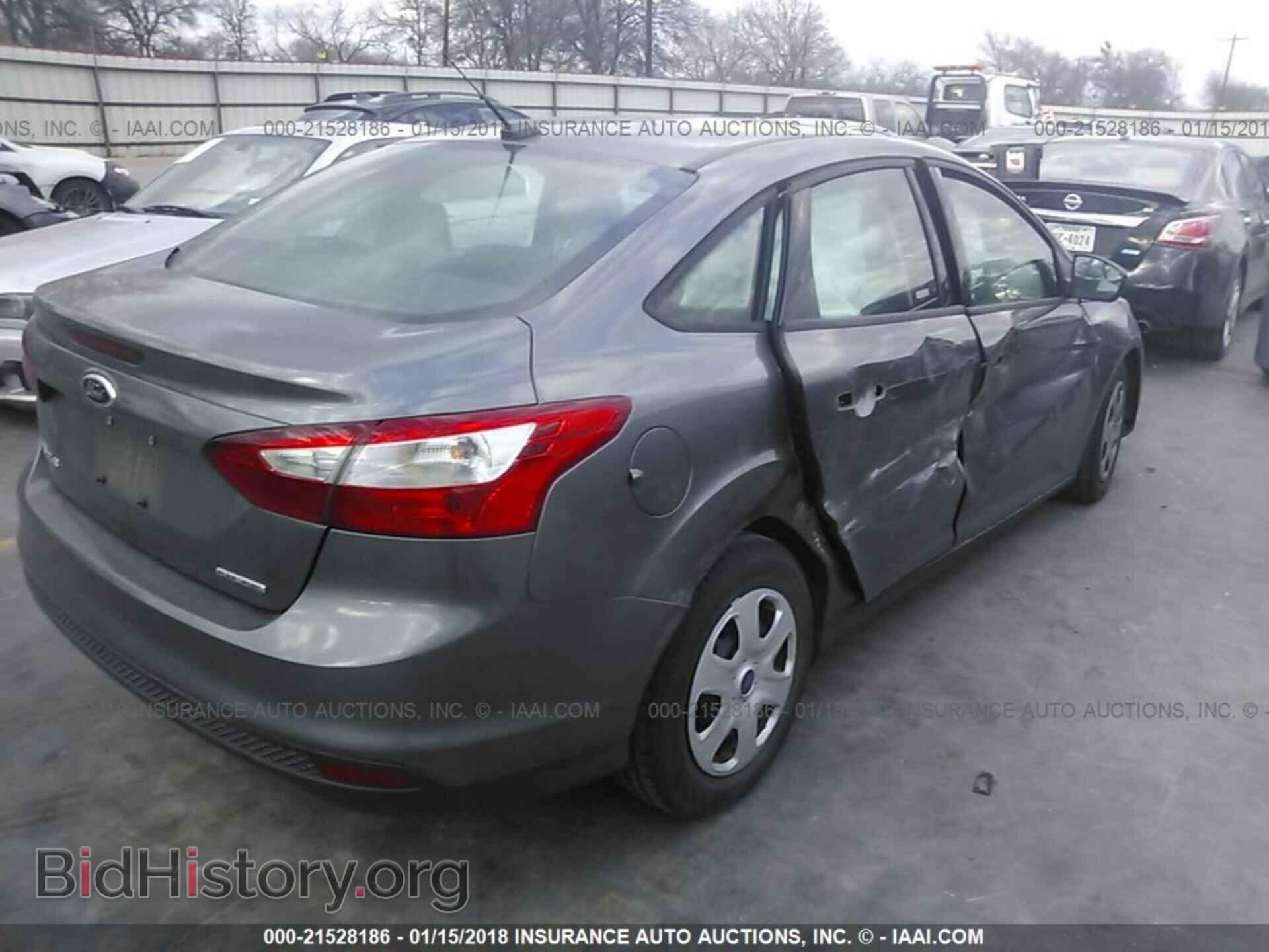 2013 Ford Focus - VIN: 1FADP3E20DL142772 - Photo 4