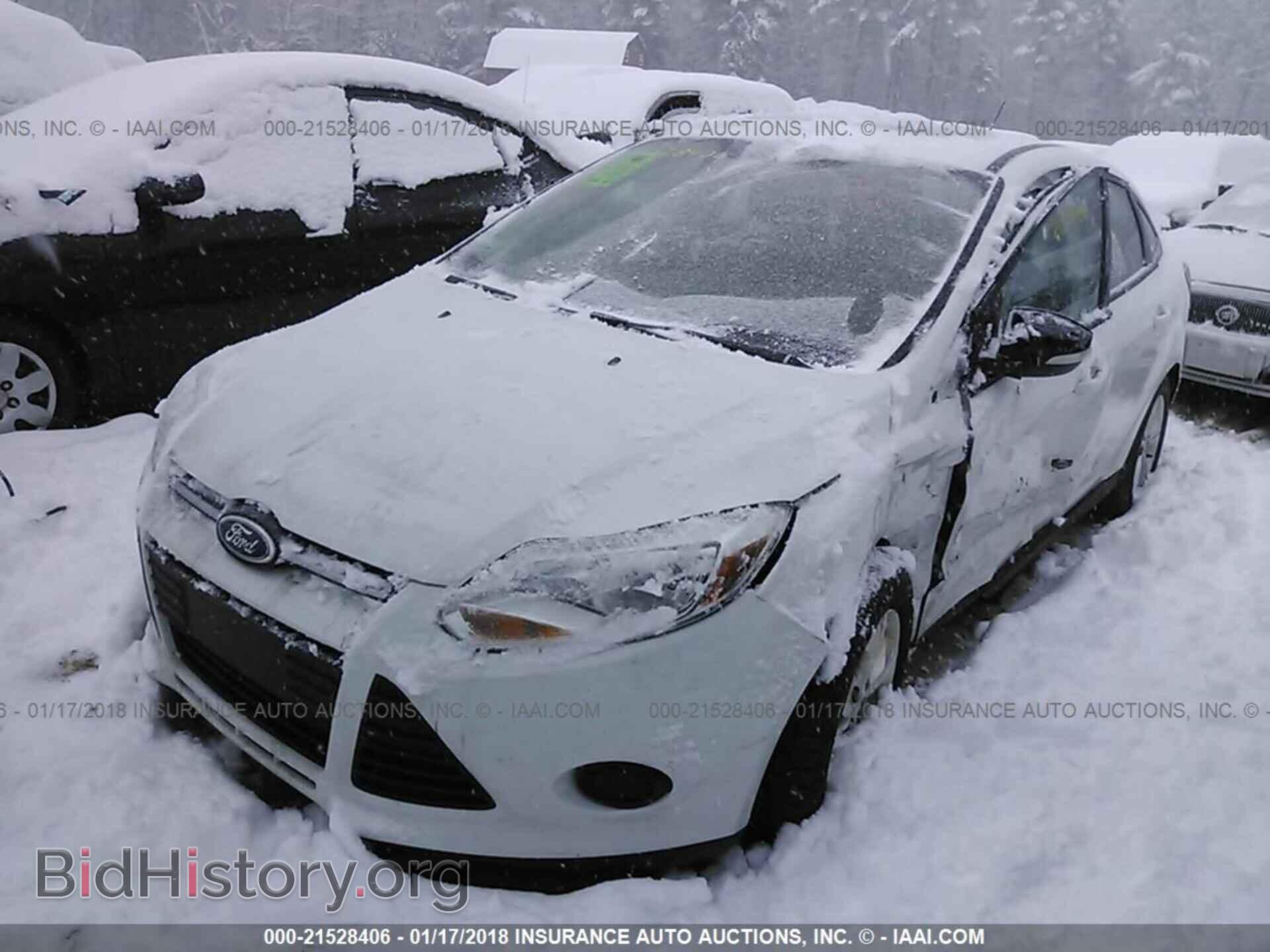 2014 Ford Focus - VIN: 1FADP3F23EL242977 - Photo 2