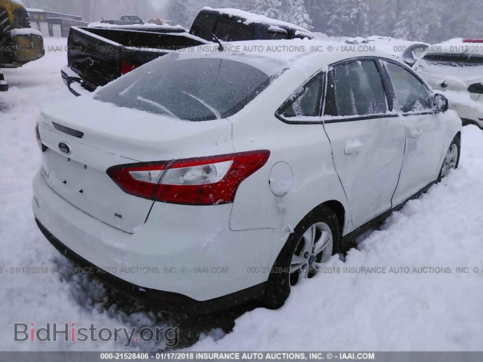 2014 Ford Focus - VIN: 1FADP3F23EL242977 - Photo 4