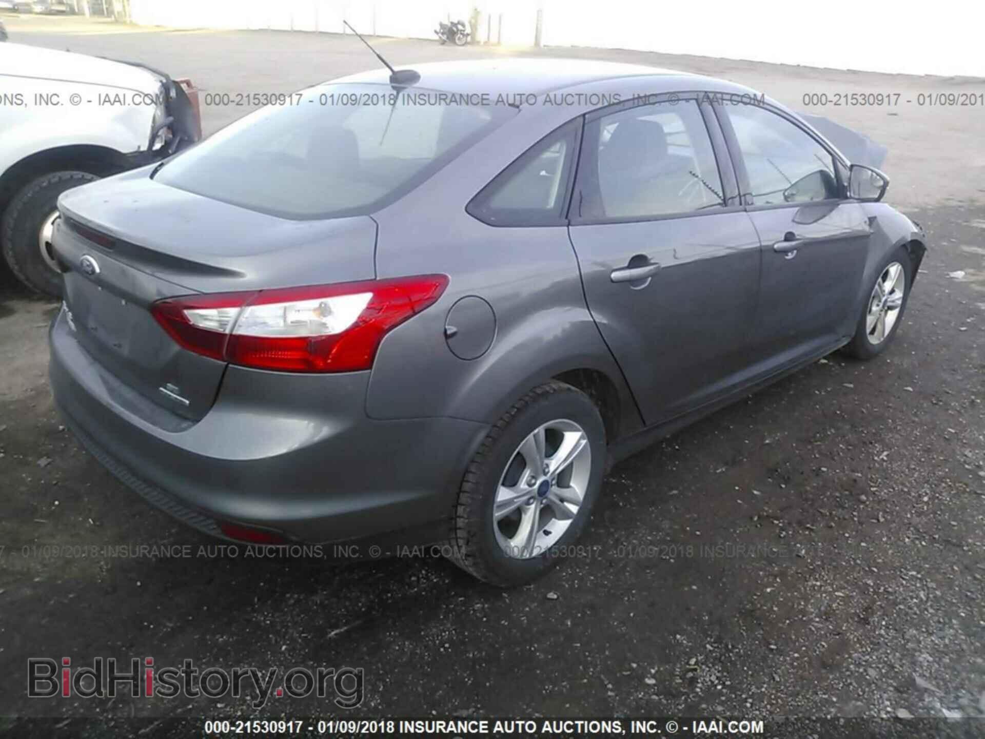 2014 Ford Focus - VIN: 1FADP3F25EL142590 - Photo 4
