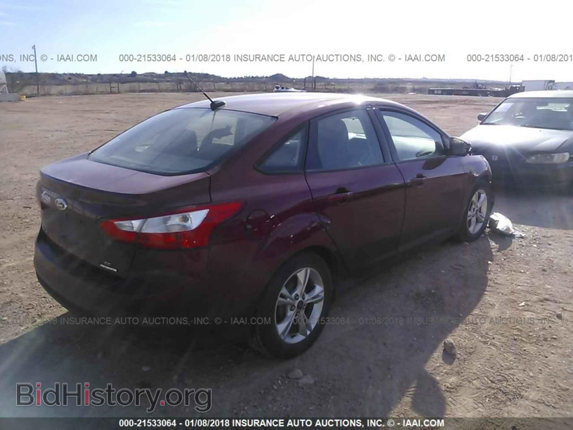 2014 Ford Focus - VIN: 1FADP3F27EL183884 - Photo 4
