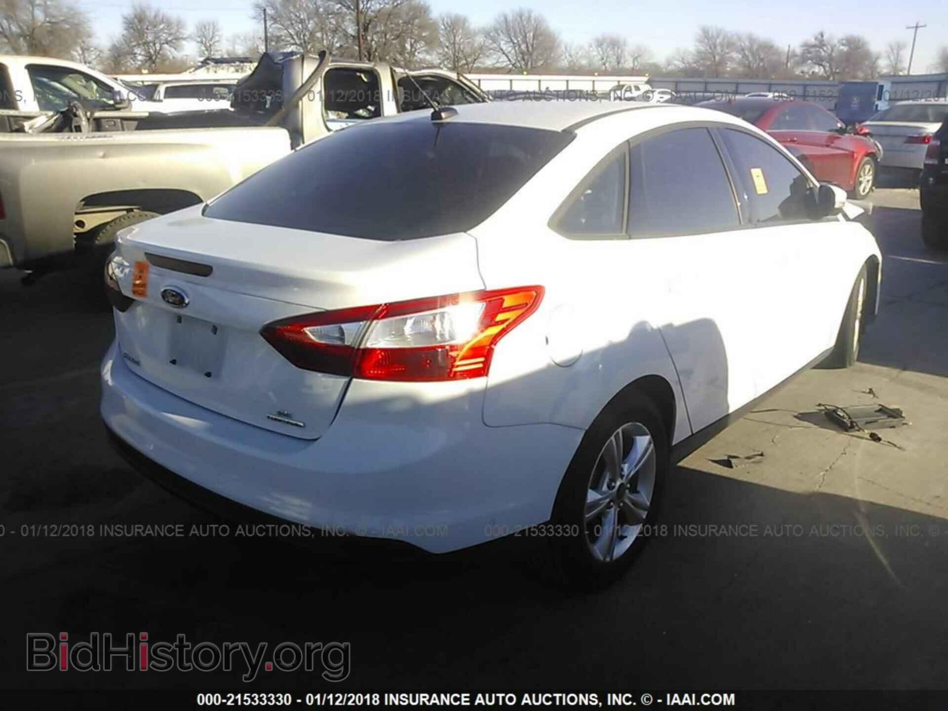 2014 Ford Focus - VIN: 1FADP3F21EL270468 - Photo 4