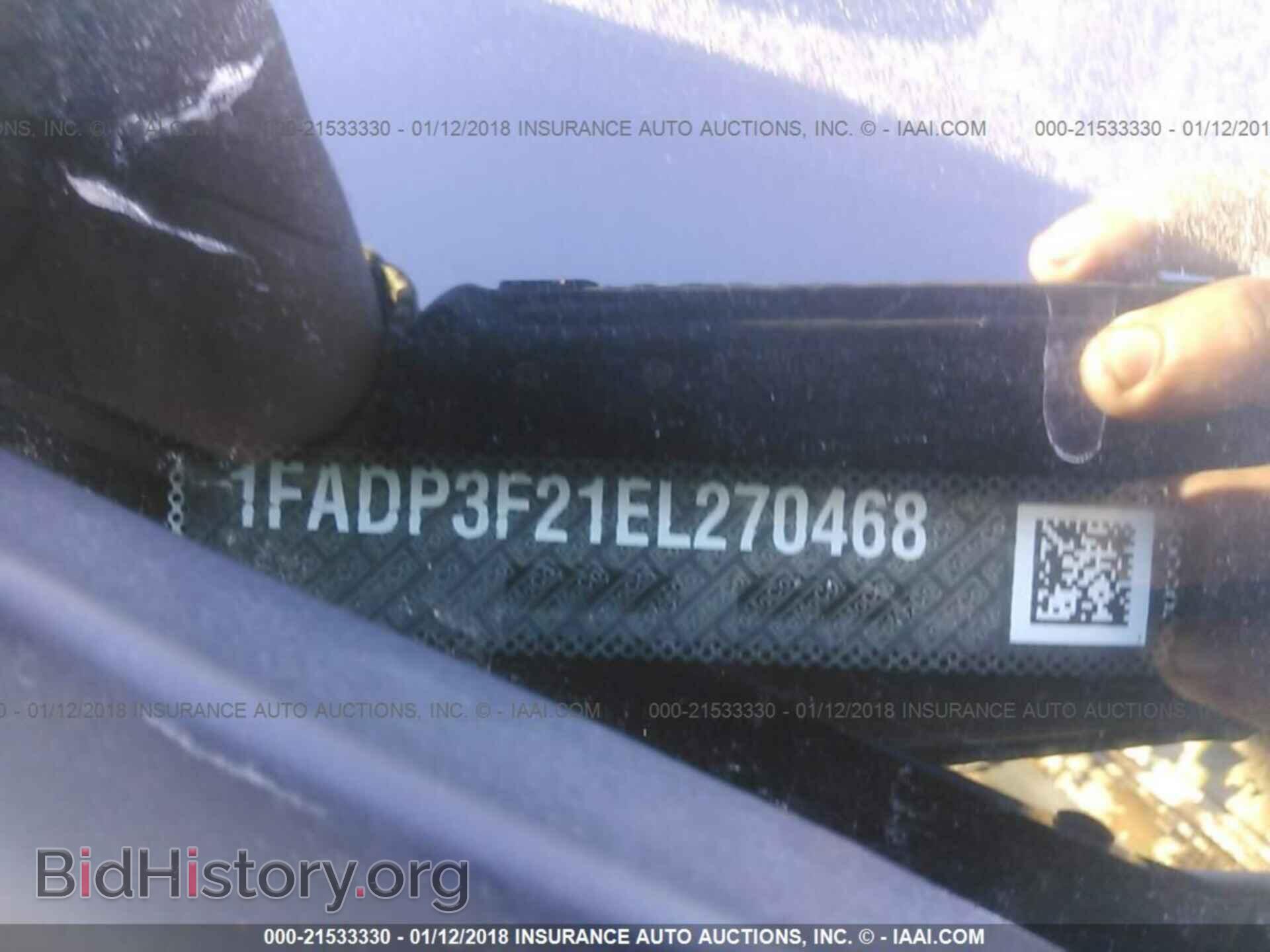 2014 Ford Focus - VIN: 1FADP3F21EL270468 - Photo 9