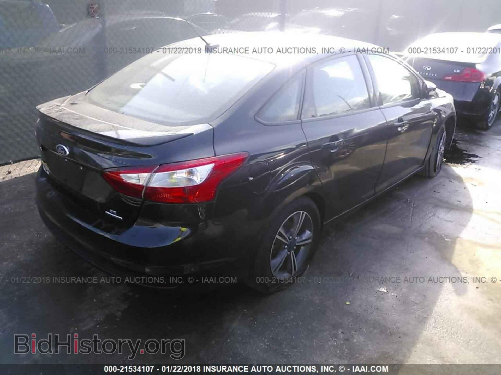 2014 Ford Focus - VIN: 1FADP3F20EL387538 - Photo 4