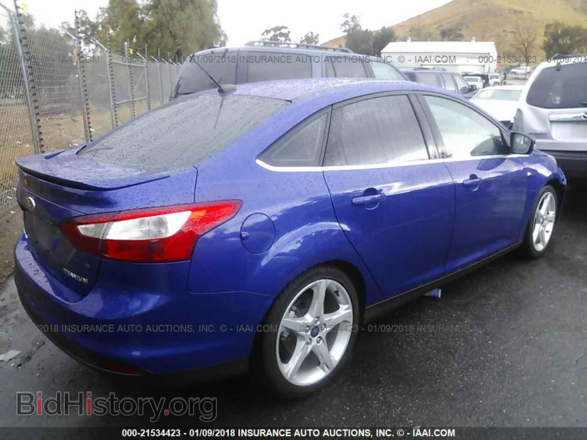 2014 Ford Focus - VIN: 1FADP3J27EL355516 - Photo 4