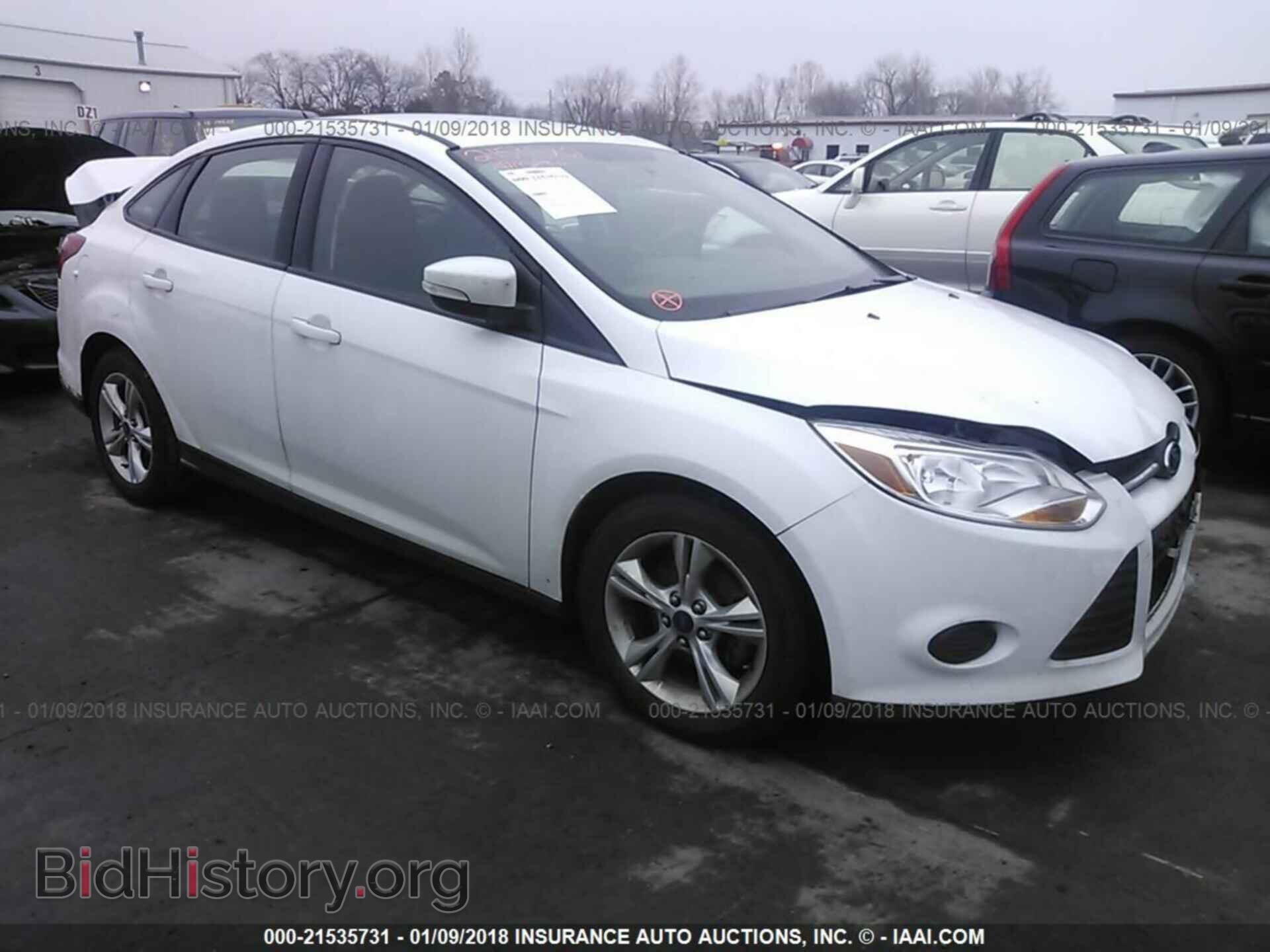 Photo 1FADP3F28DL320877 - Ford Focus 2013