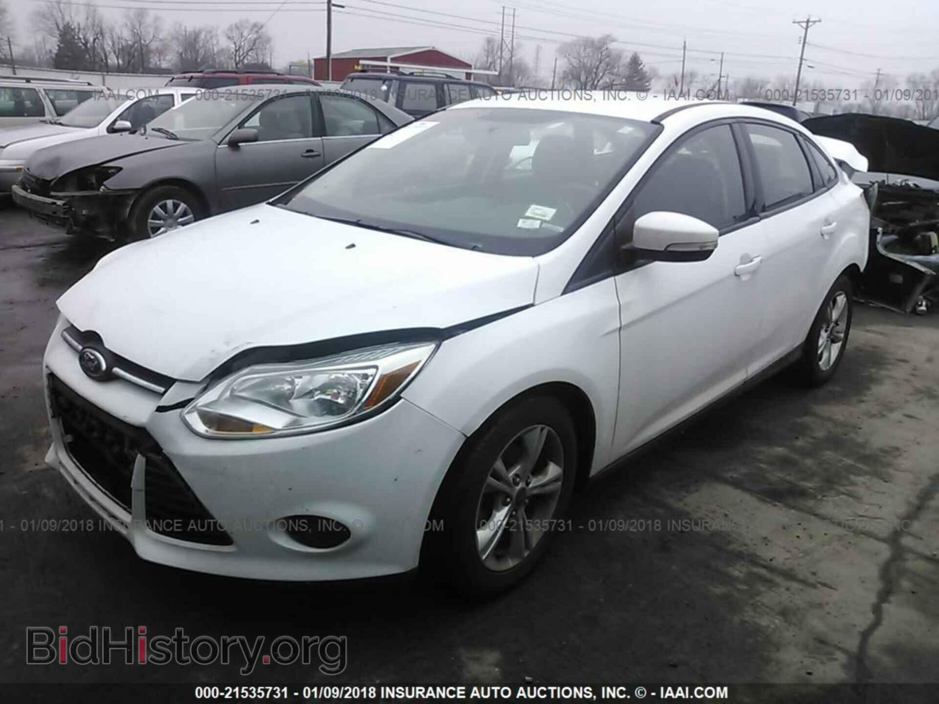 2013 Ford Focus - VIN: 1FADP3F28DL320877 - Photo 2