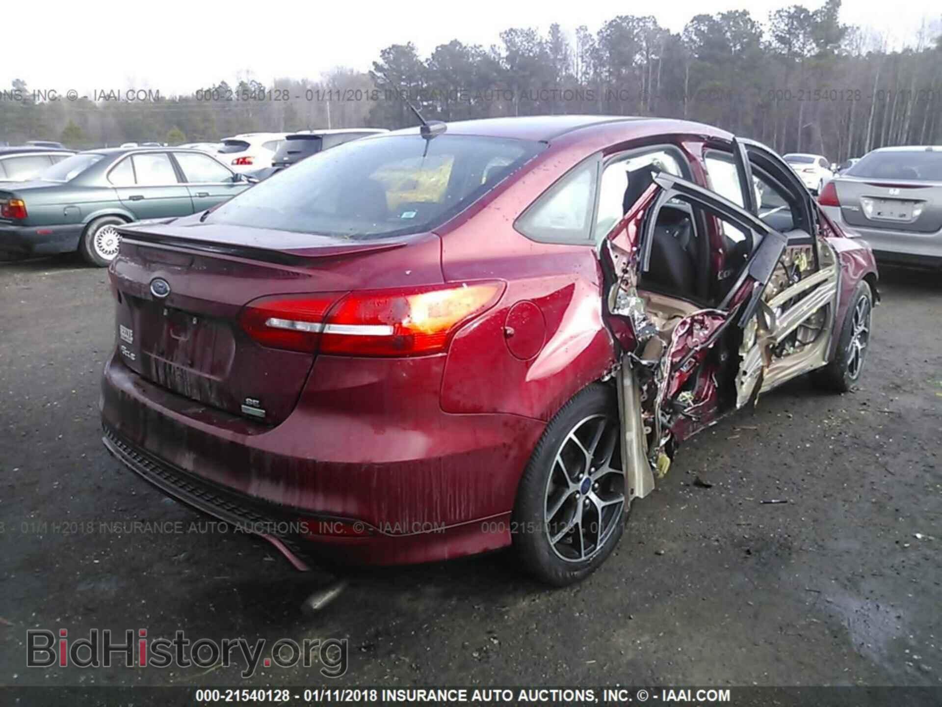 2015 Ford Focus - VIN: 1FADP3FE3FL333968 - Photo 4