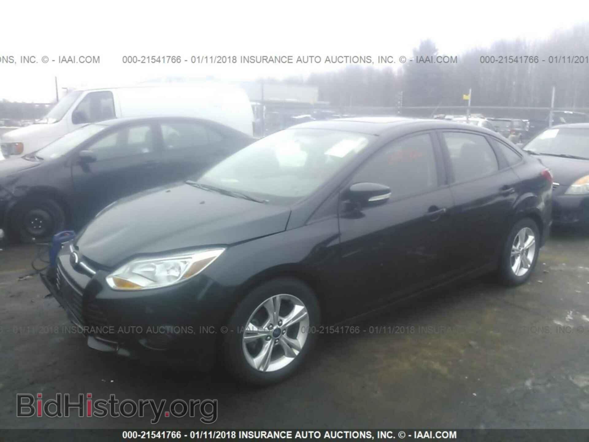 2014 Ford Focus - VIN: 1FADP3F24EL257410 - Photo 2