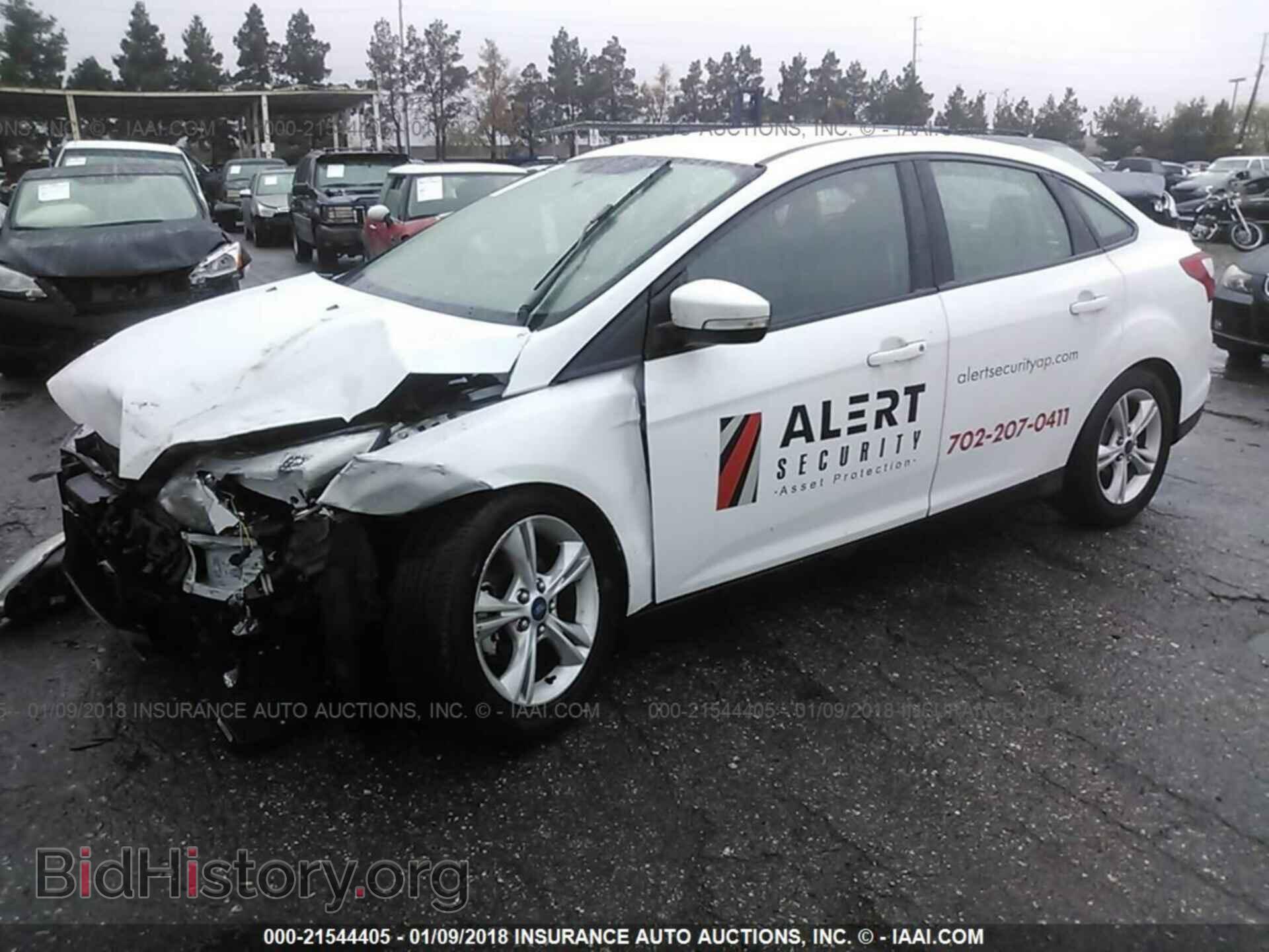 2014 Ford Focus - VIN: 1FADP3F26EL408053 - Фото 2