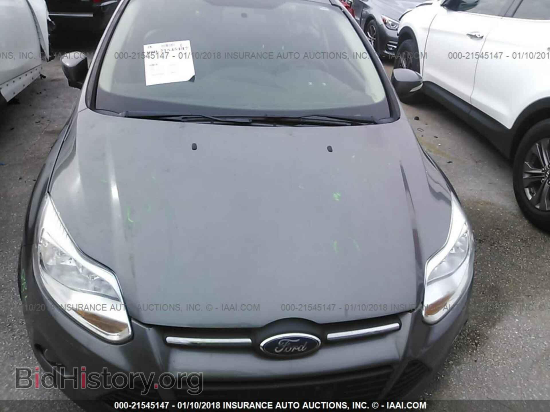 2014 Ford Focus - VIN: 1FADP3K24EL258059 - Фото 6