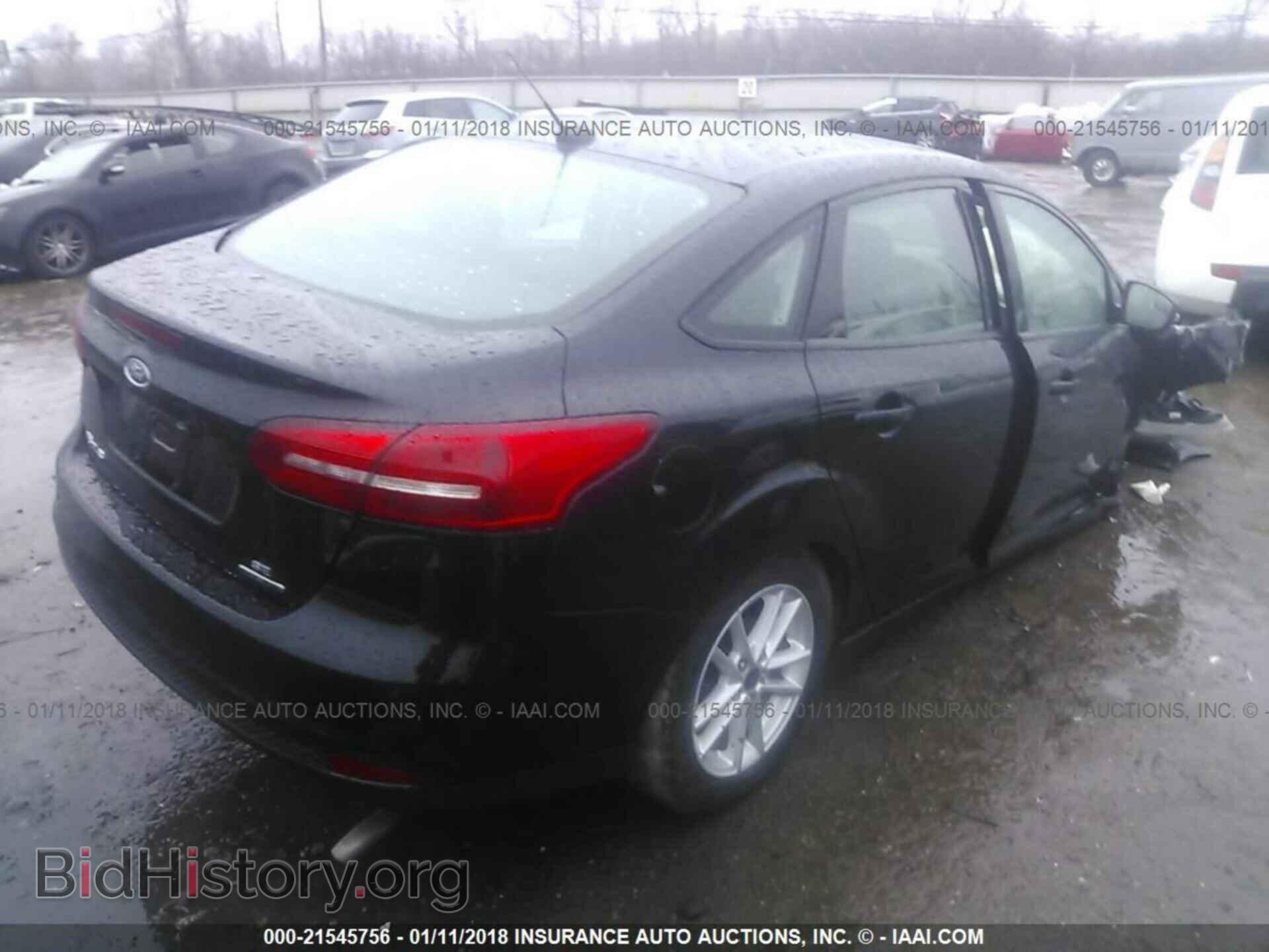 2016 Ford Focus - VIN: 1FADP3F27GL394697 - Фото 4