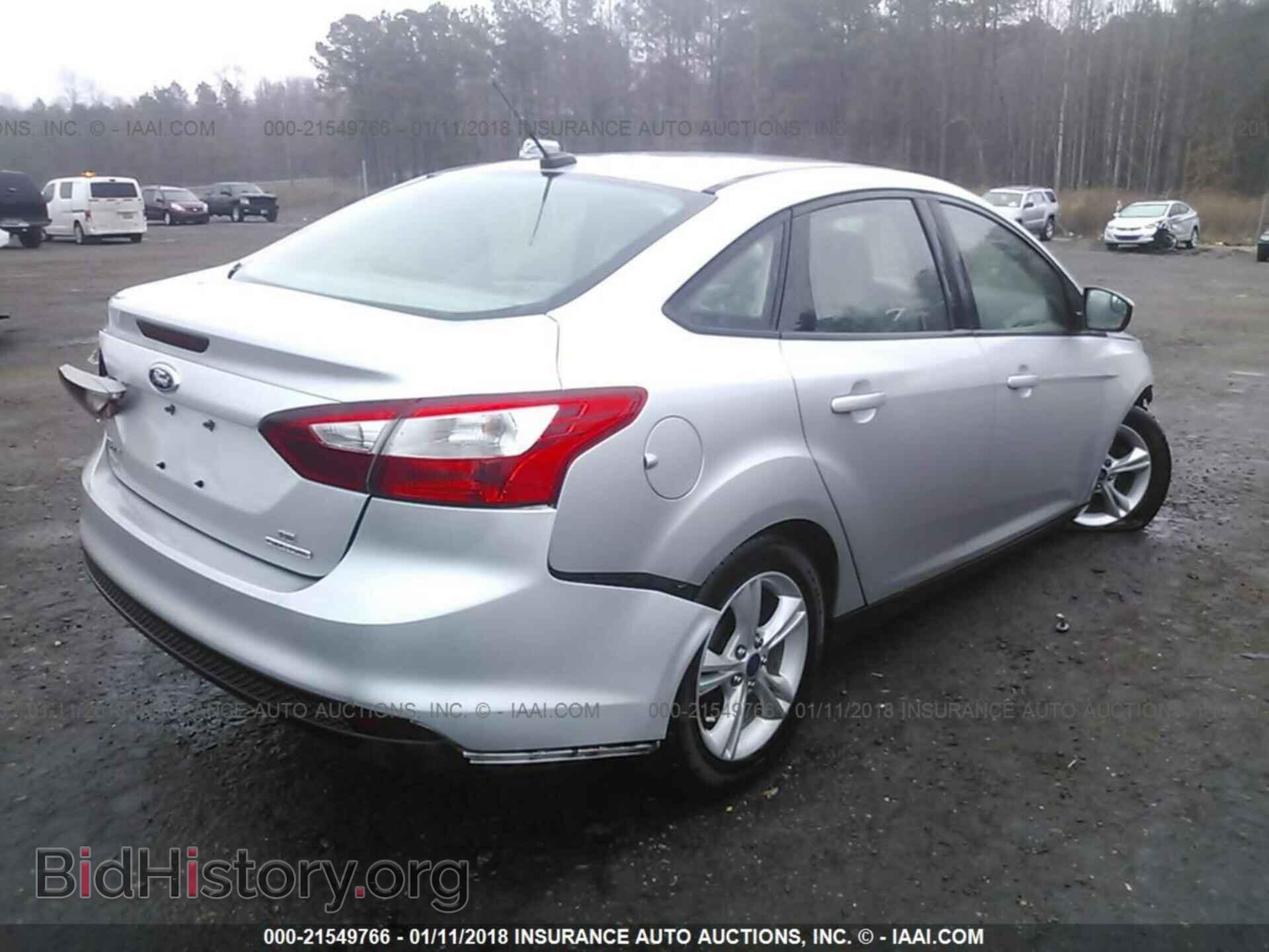 2014 Ford Focus - VIN: 1FADP3F21EL447164 - Photo 4