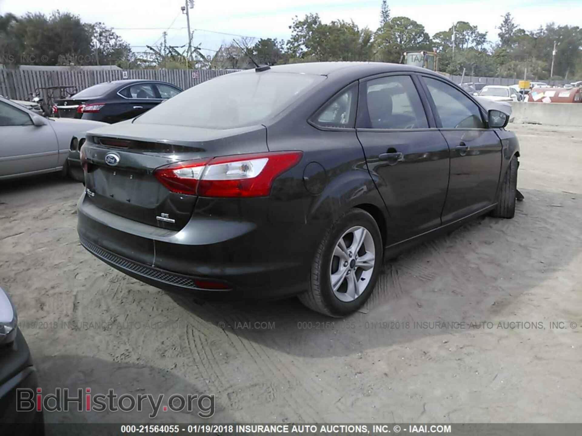 2014 Ford Focus - VIN: 1FADP3F24EL448115 - Фото 4