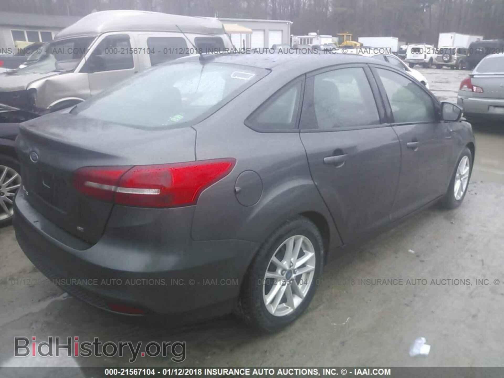 2015 Ford Focus - VIN: 1FADP3F28FL371735 - Photo 4