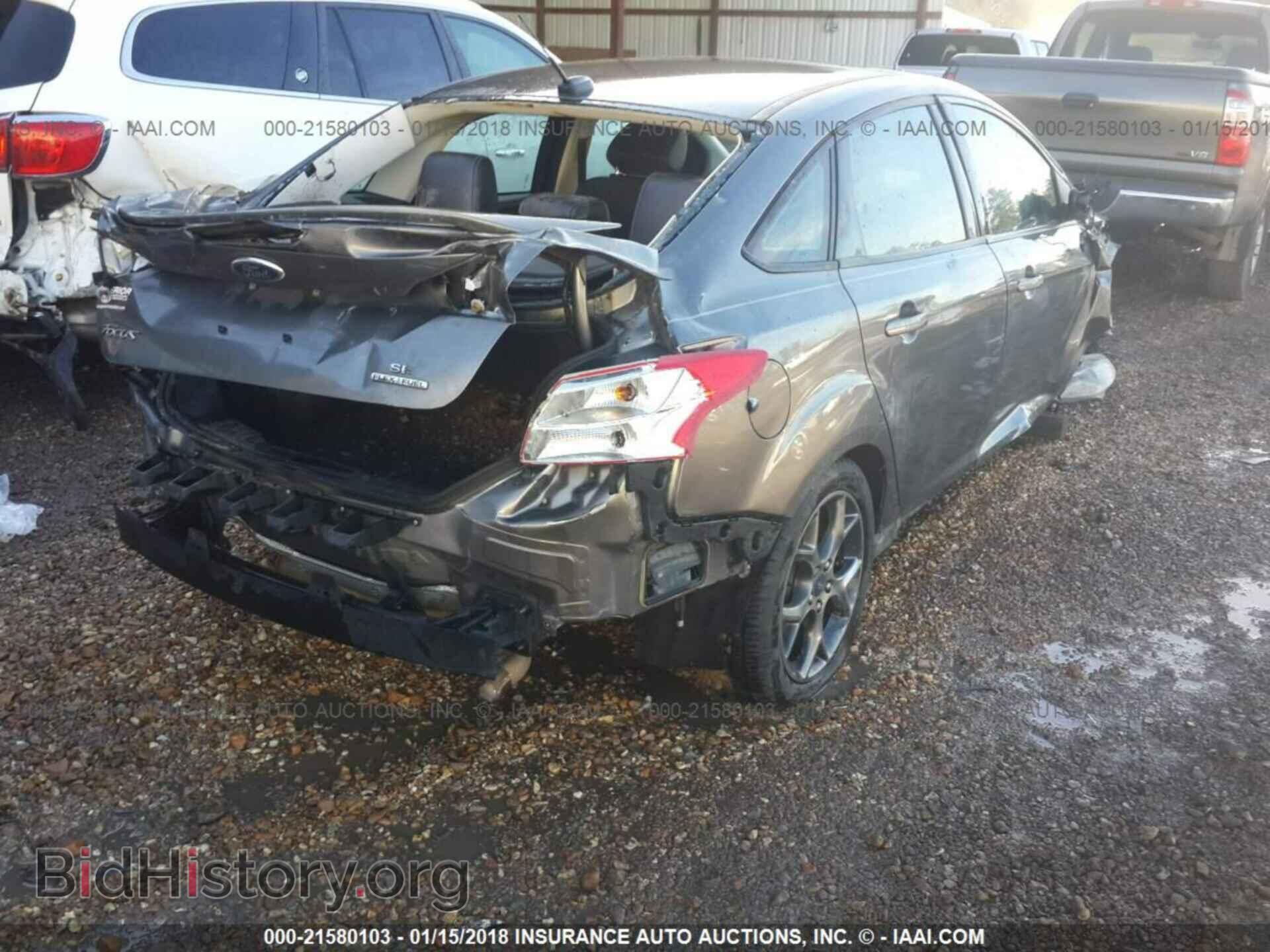 2014 Ford Focus - VIN: 1FADP3F21EL203563 - Photo 4