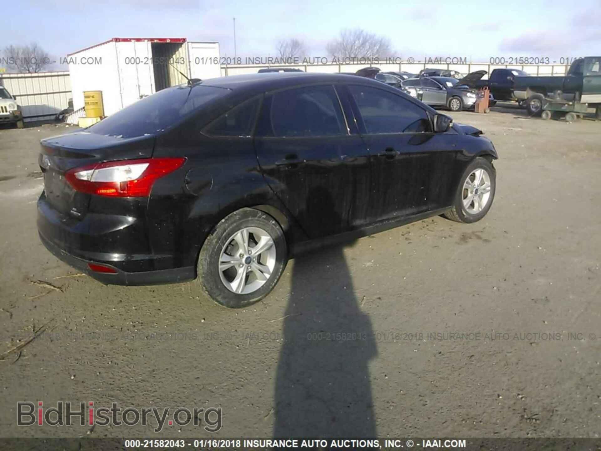 2014 Ford Focus - VIN: 1FADP3F2XEL413207 - Photo 4