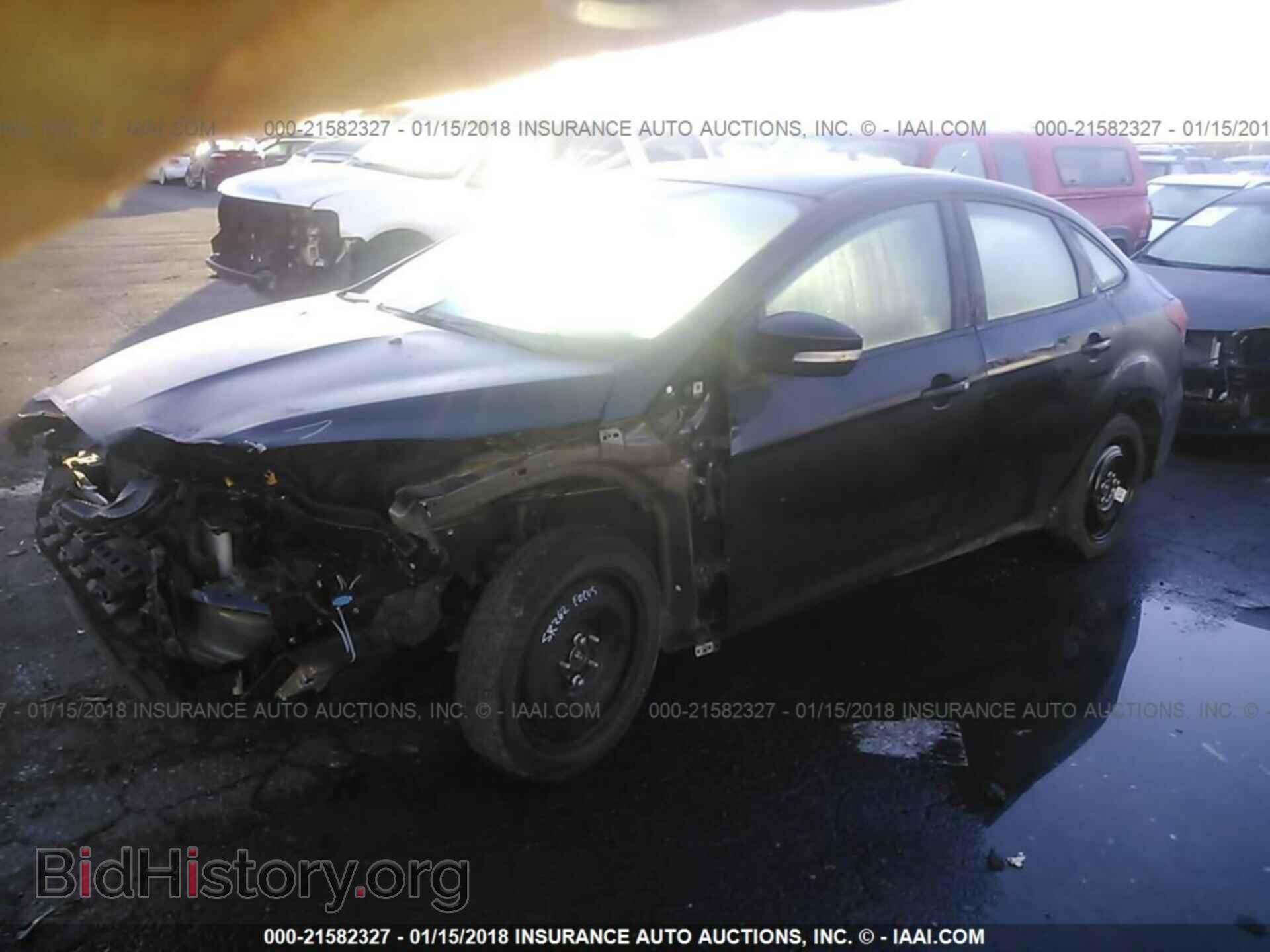 2015 Ford Focus - VIN: 1FADP3F25FL206077 - Photo 2
