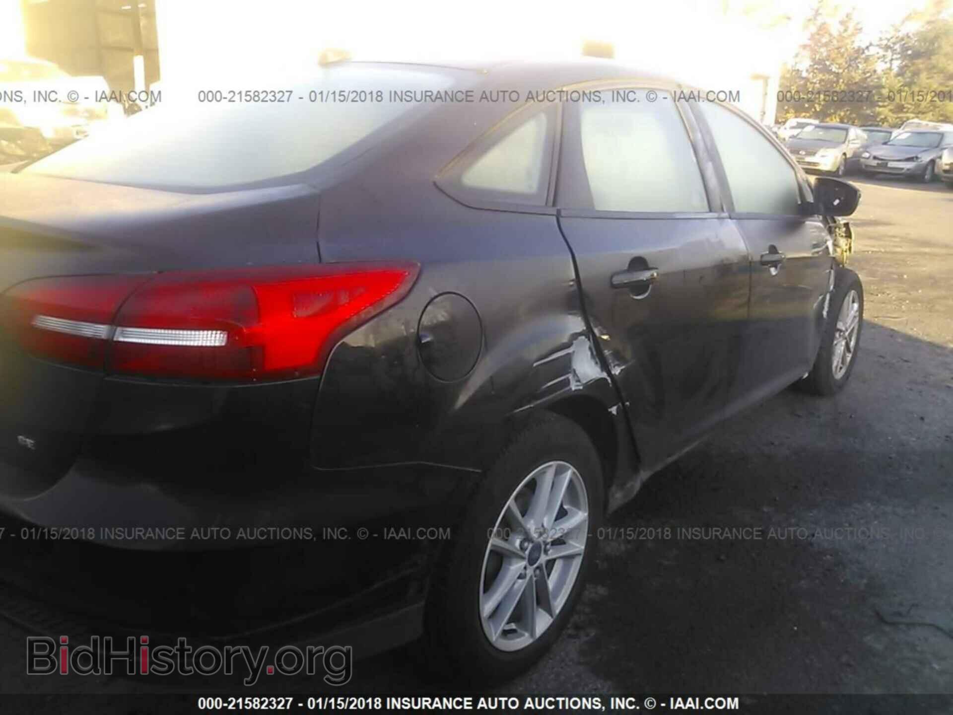 2015 Ford Focus - VIN: 1FADP3F25FL206077 - Photo 4