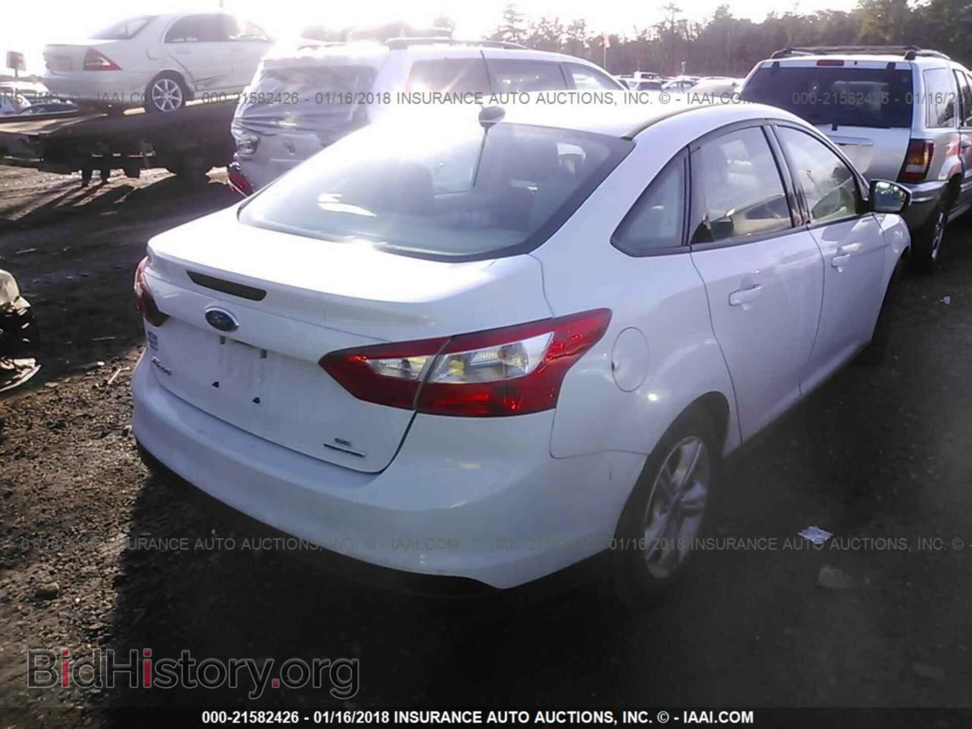 2014 Ford Focus - VIN: 1FADP3F26EL368055 - Фото 4