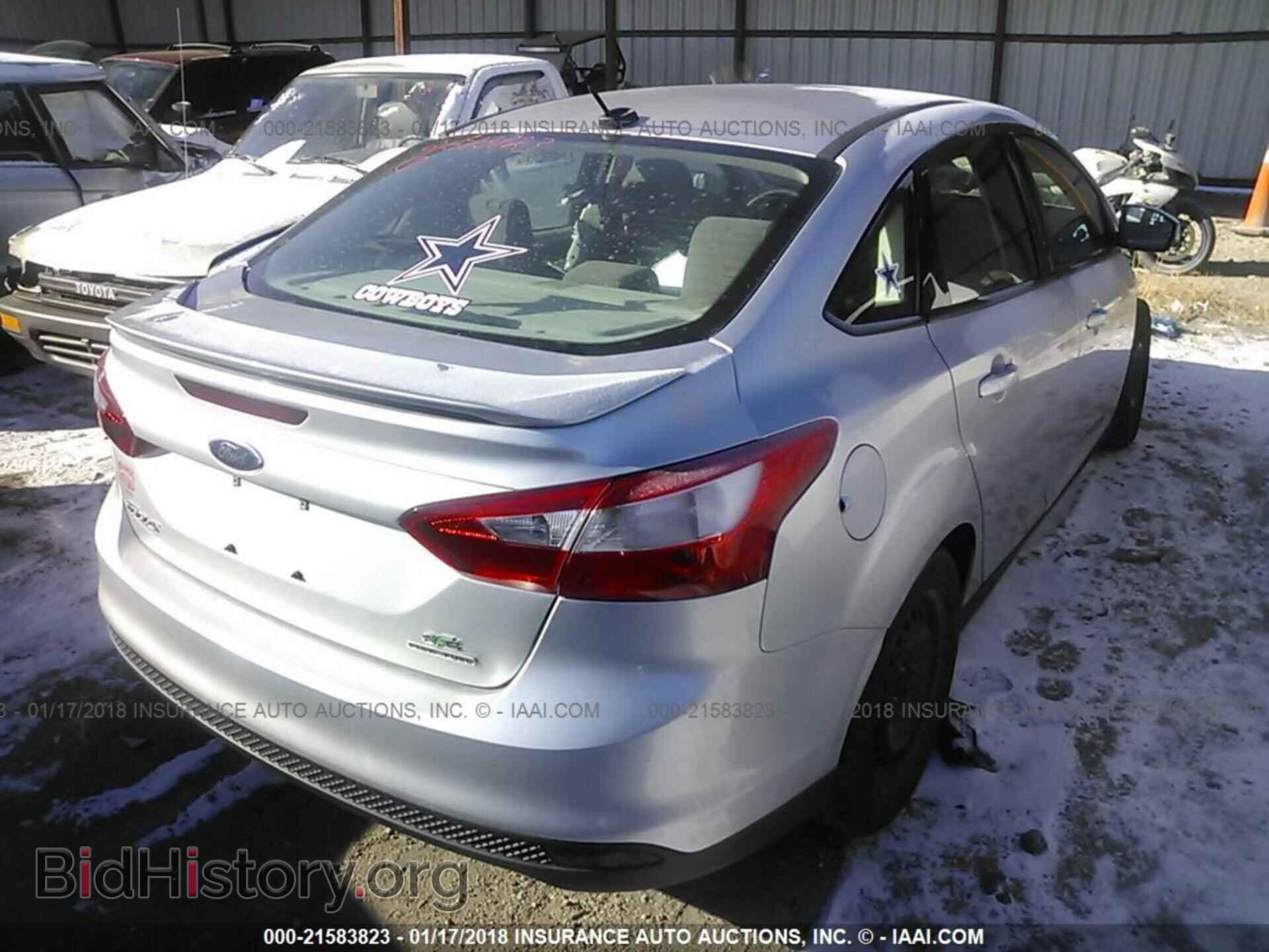 2014 Ford Focus - VIN: 1FADP3F21EL351468 - Фото 4