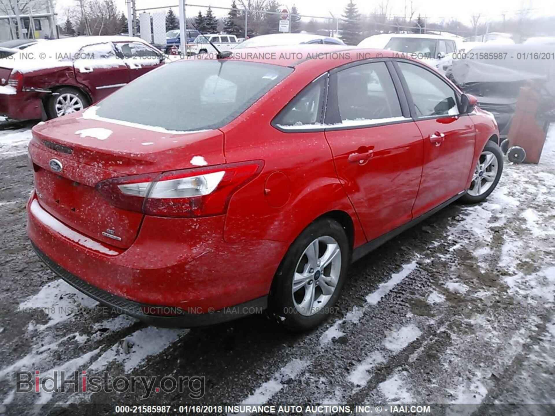 2014 Ford Focus - VIN: 1FADP3F24EL371181 - Фото 4