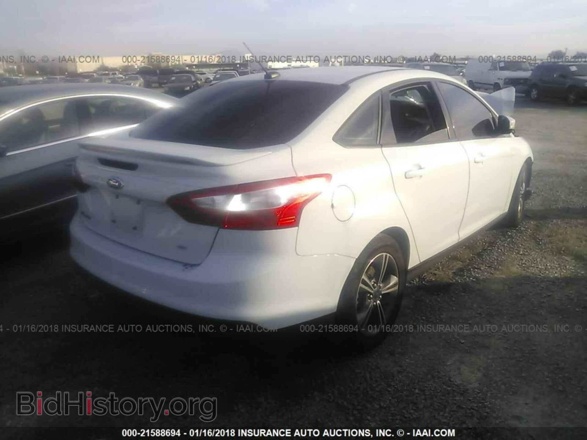 2014 Ford Focus - VIN: 1FADP3F28EL311789 - Фото 4