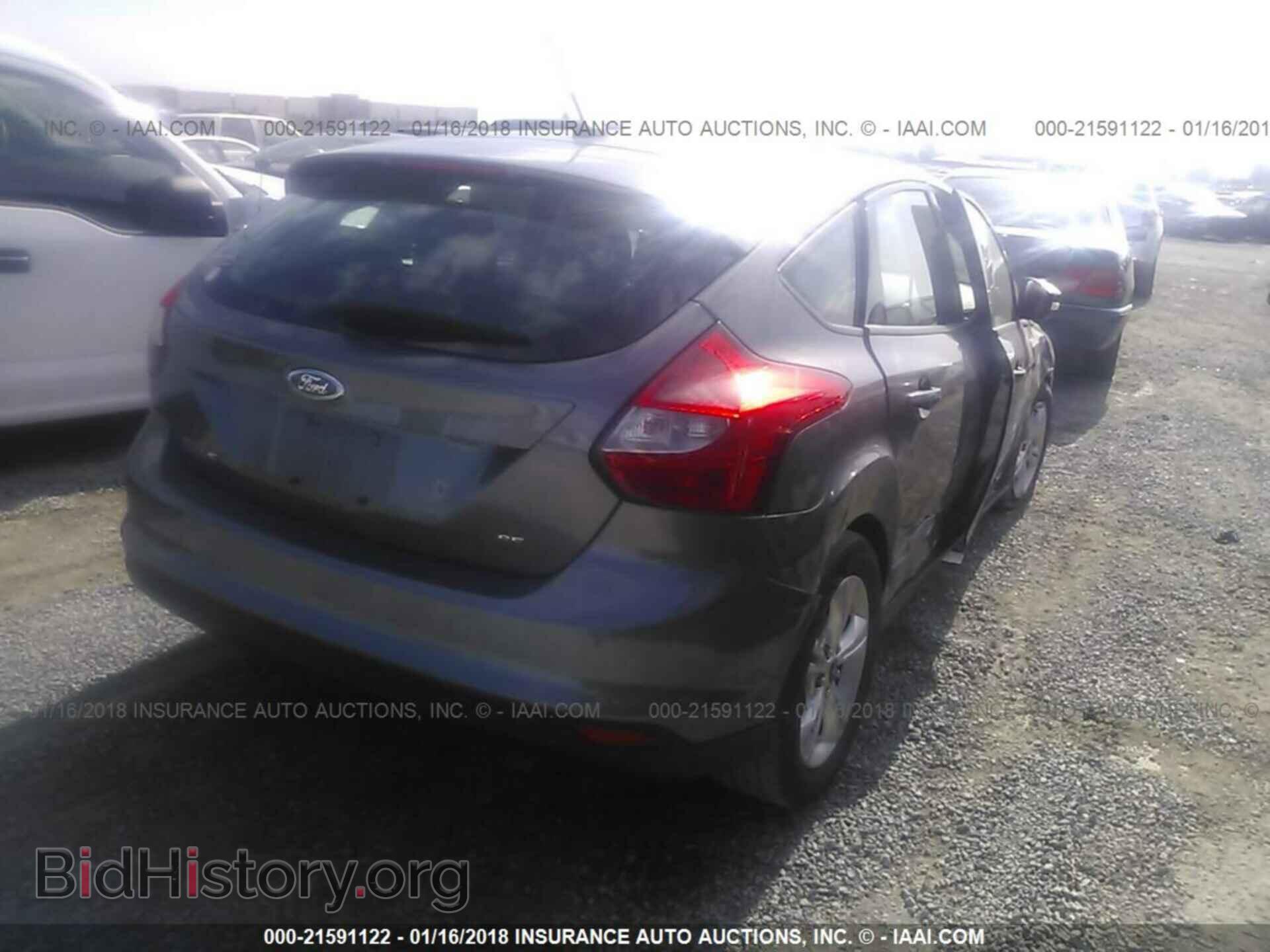 2014 Ford Focus - VIN: 1FADP3K21EL382208 - Фото 4