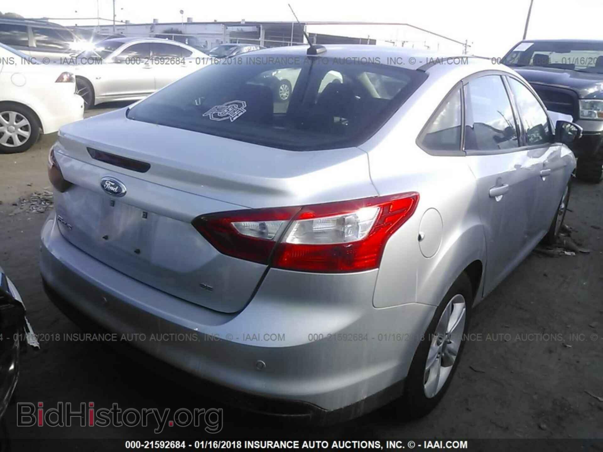 2014 Ford Focus - VIN: 1FADP3F28EL215290 - Фото 4