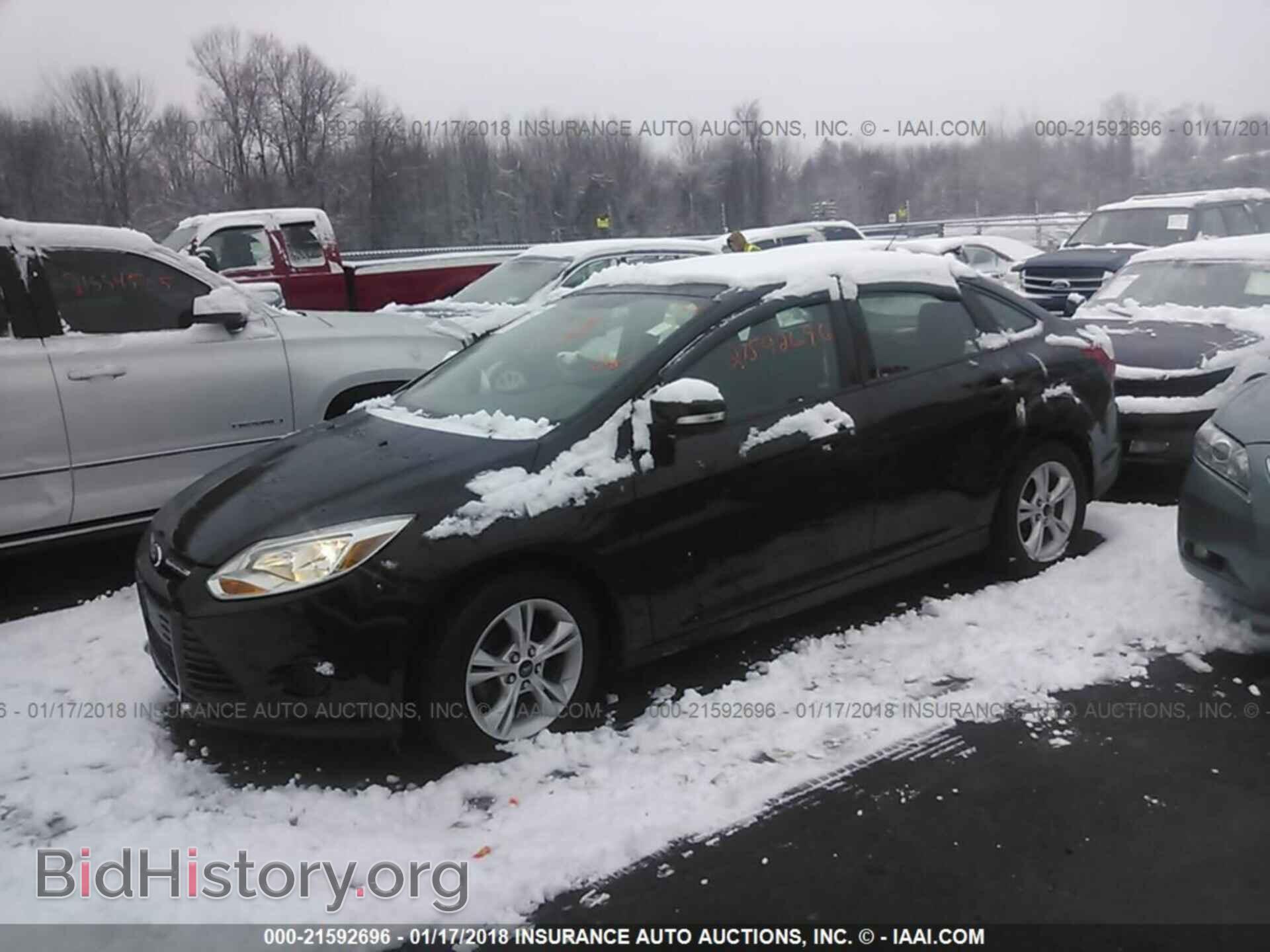 2014 Ford Focus - VIN: 1FADP3F24EL402087 - Photo 2