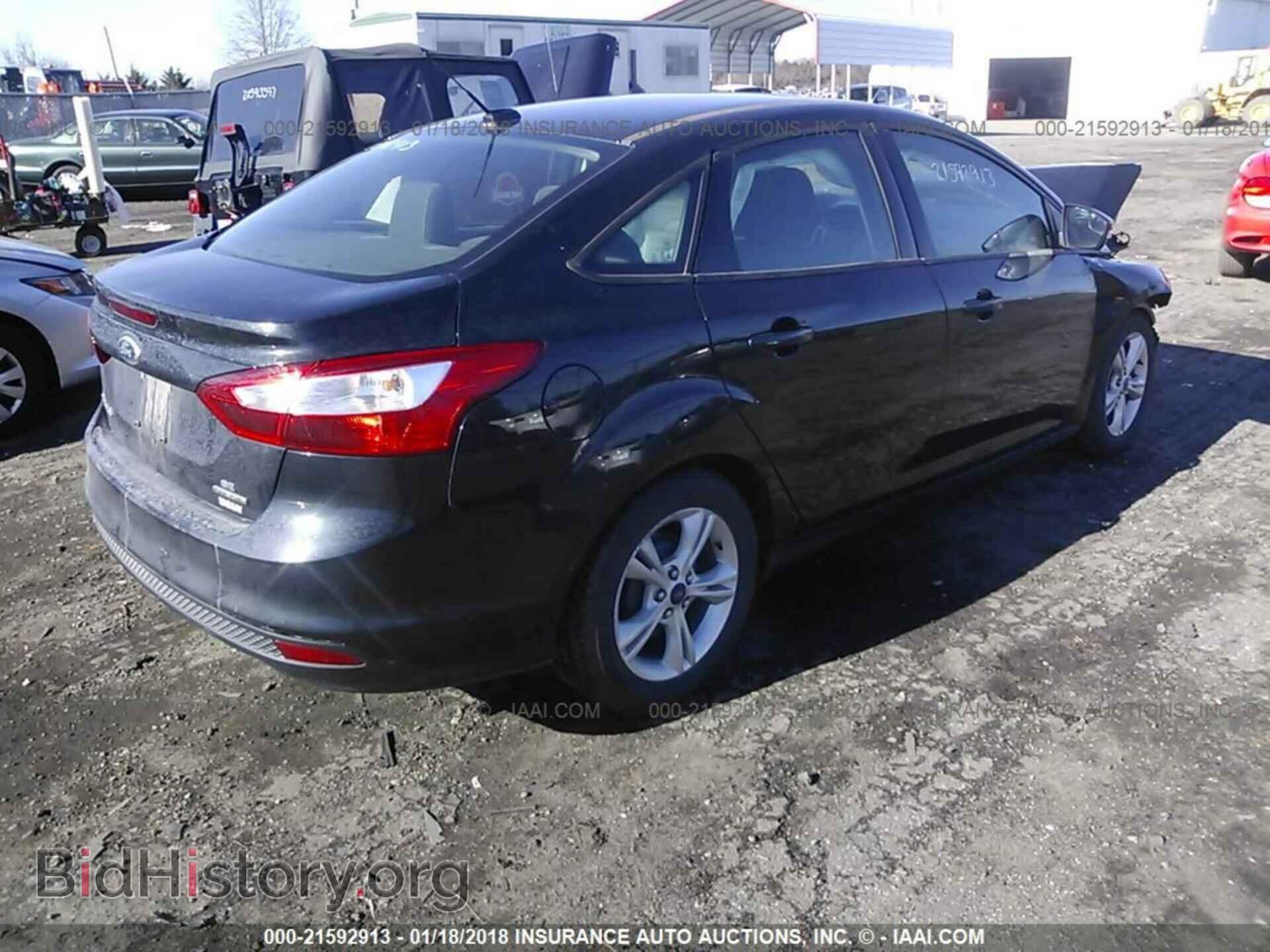 2014 Ford Focus - VIN: 1FADP3F23EL436084 - Photo 4