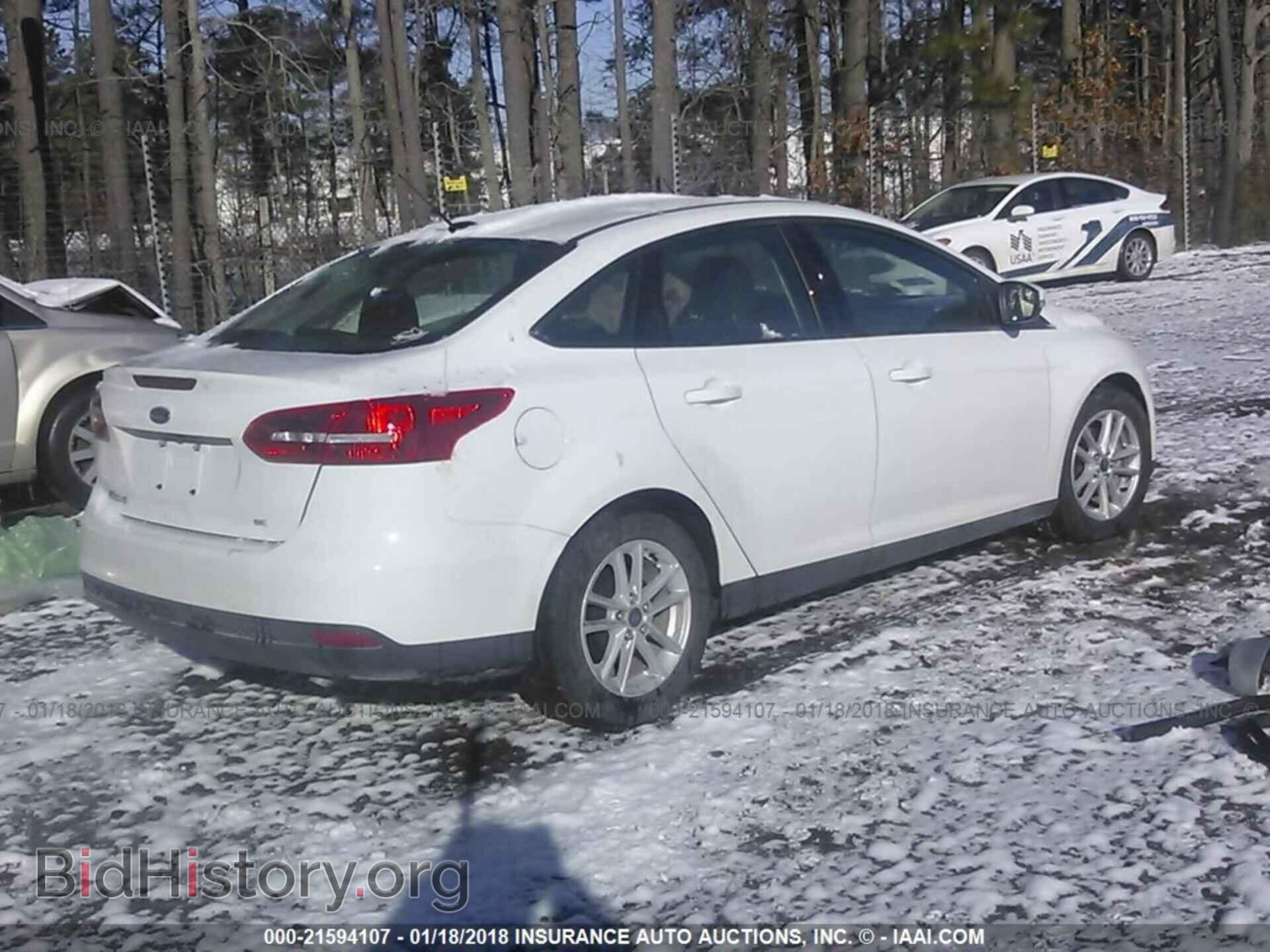 2017 Ford Focus - VIN: 1FADP3F2XHL288942 - Photo 4