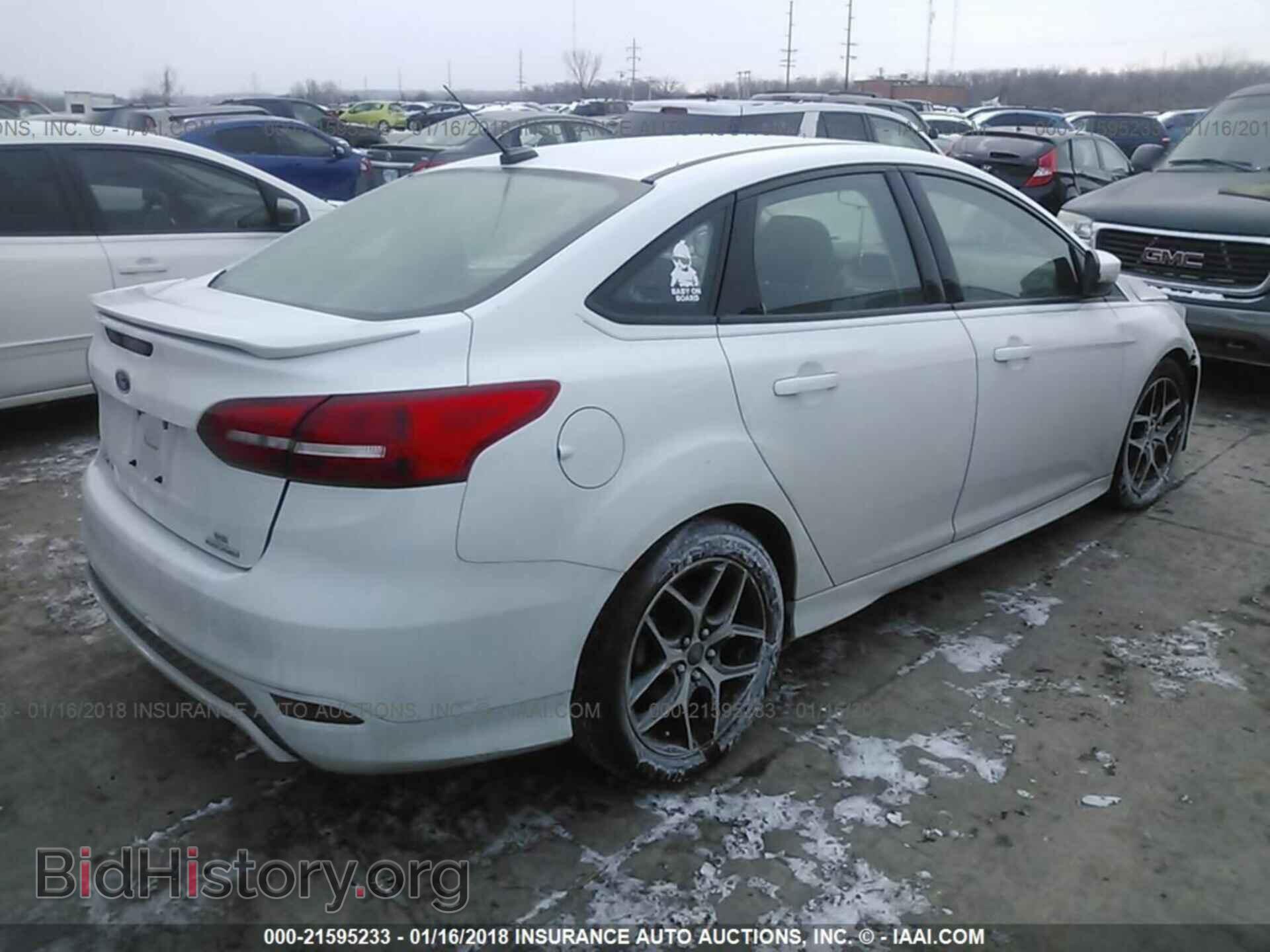 2015 Ford Focus - VIN: 1FADP3F20FL214409 - Photo 4