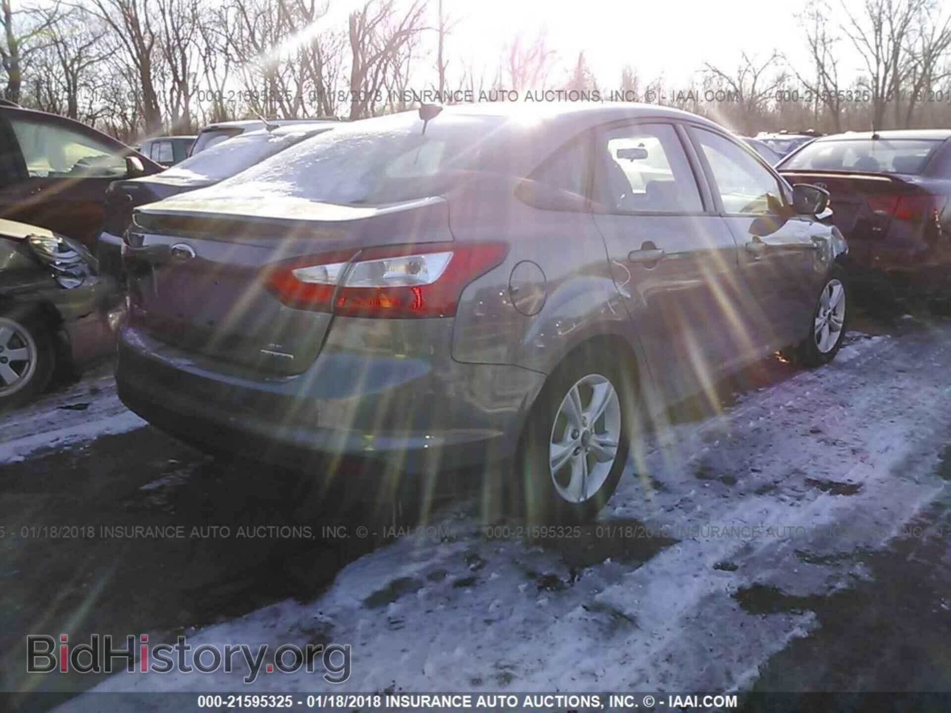 2014 Ford Focus - VIN: 1FADP3F25EL460757 - Photo 4