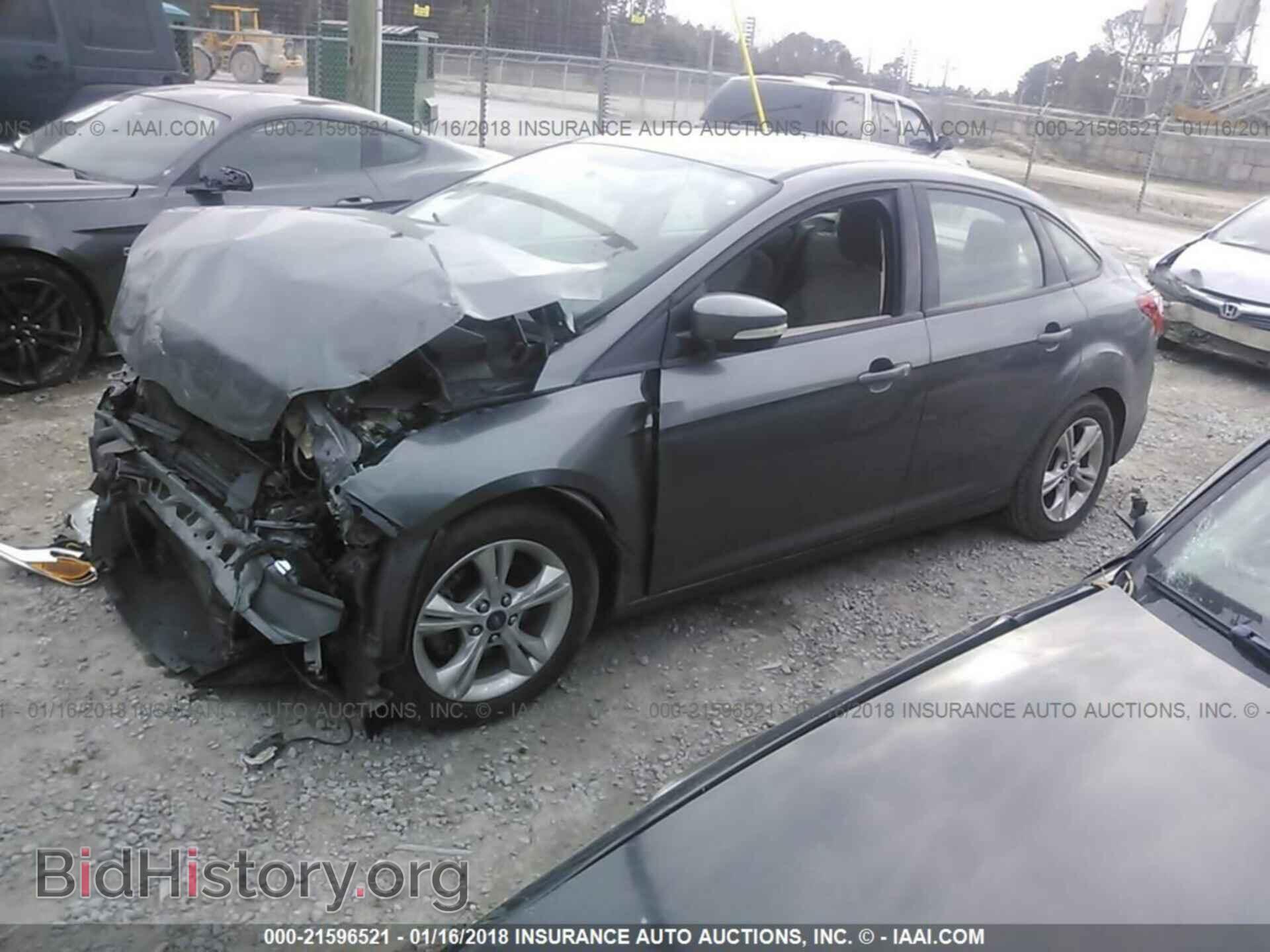 2014 Ford Focus - VIN: 1FADP3F20EL115183 - Фото 2