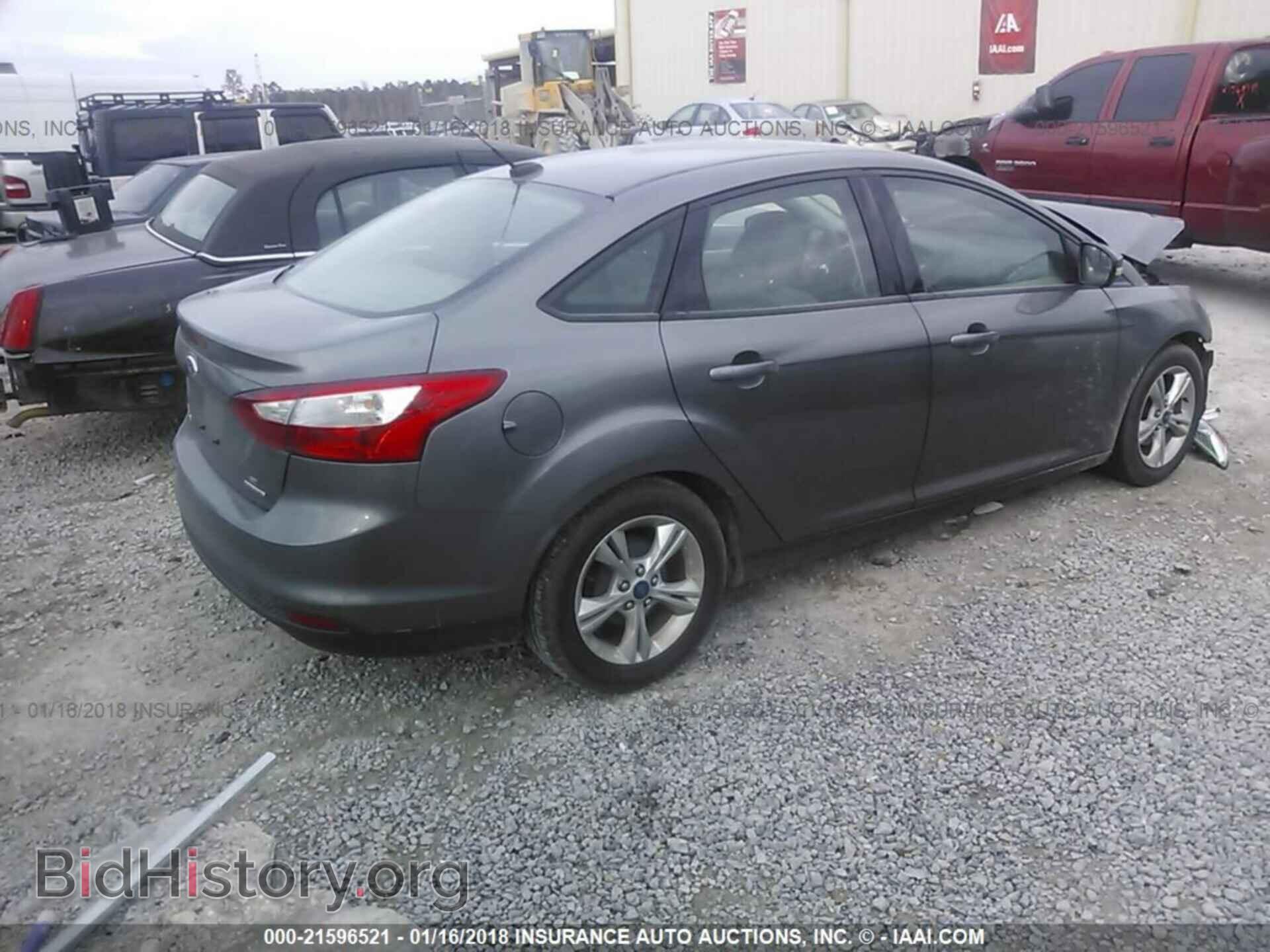 2014 Ford Focus - VIN: 1FADP3F20EL115183 - Фото 4