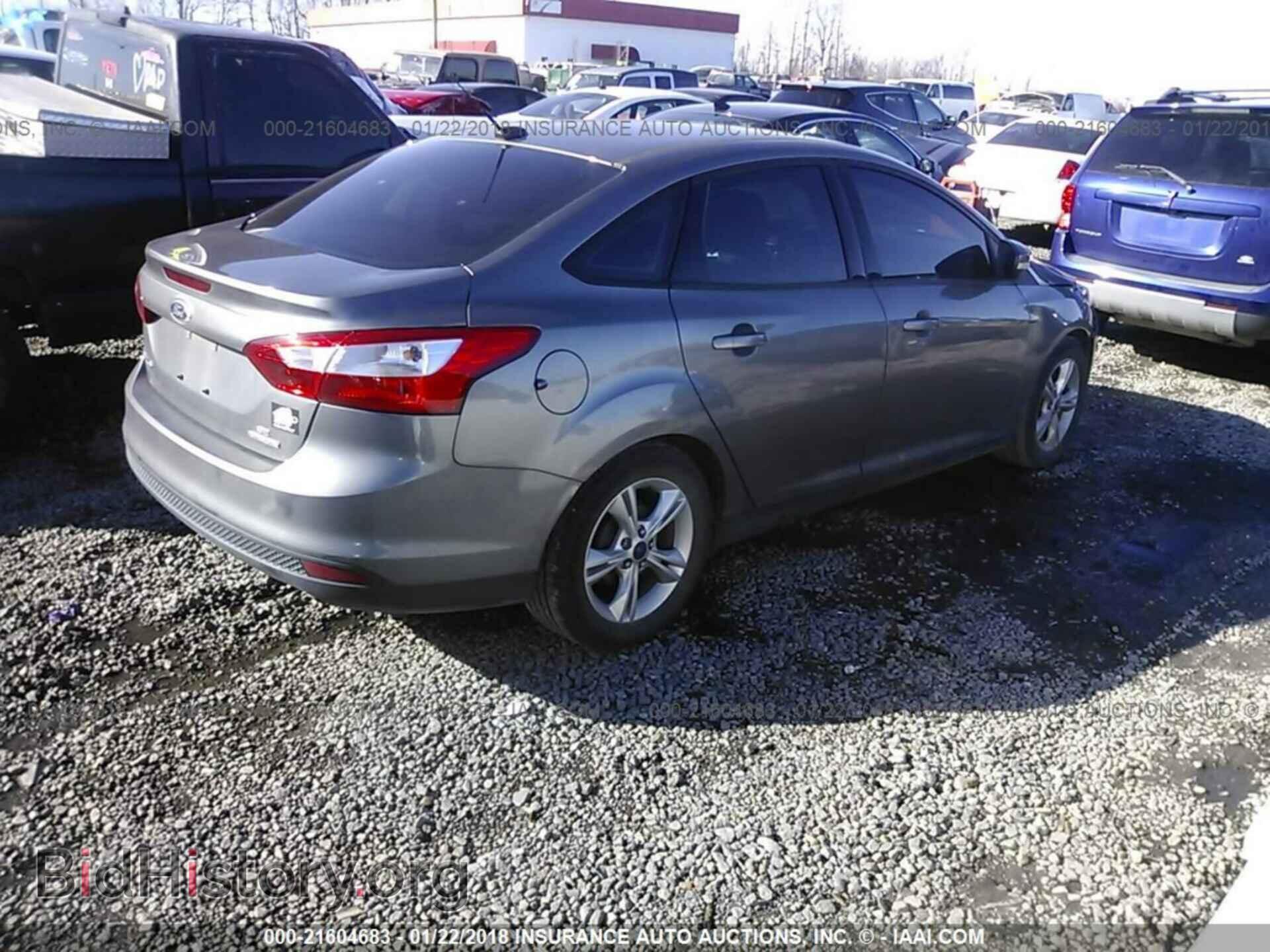 2014 Ford Focus - VIN: 1FADP3F2XEL179943 - Photo 4