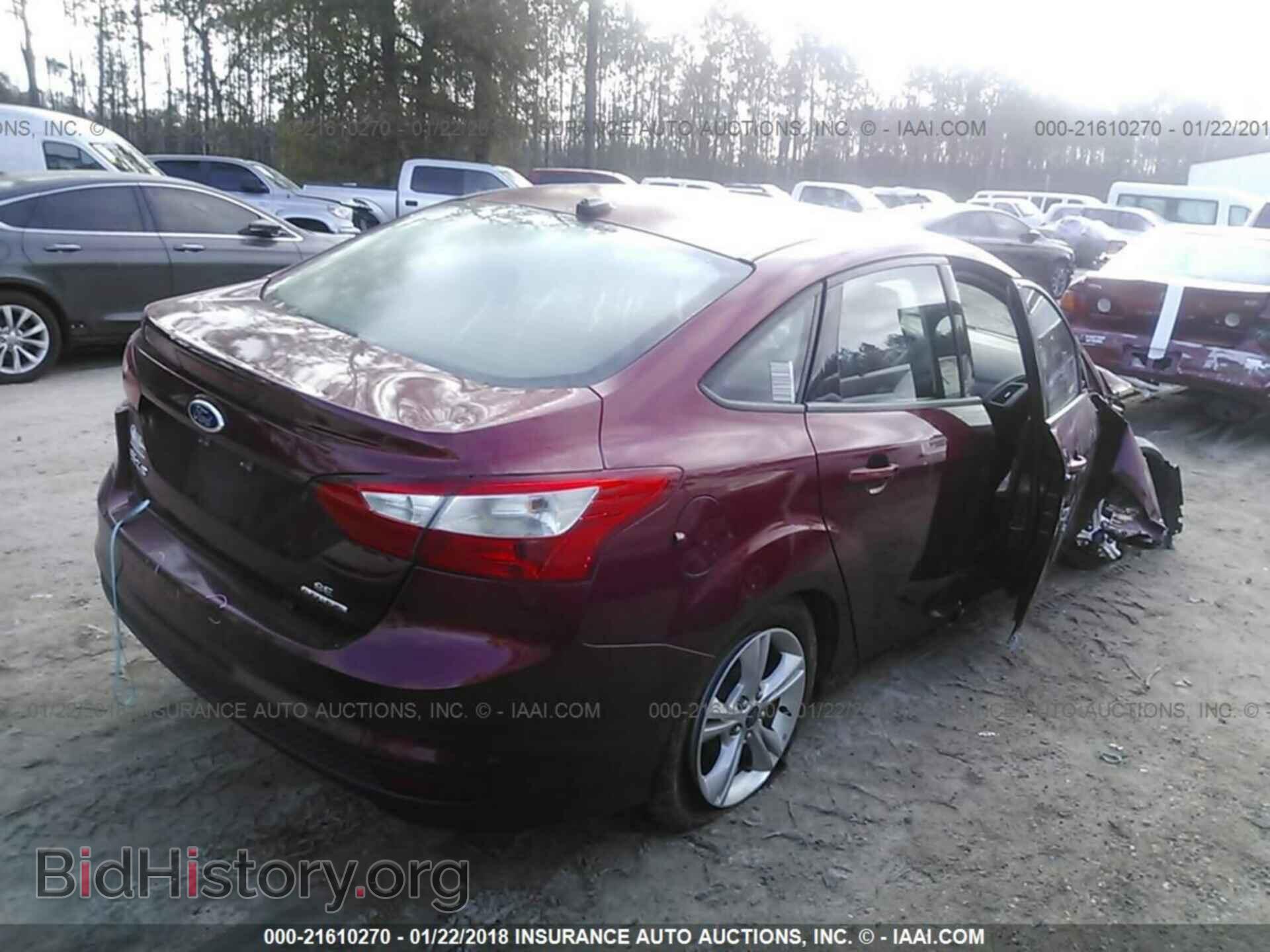 2014 Ford Focus - VIN: 1FADP3F2XEL214089 - Photo 4