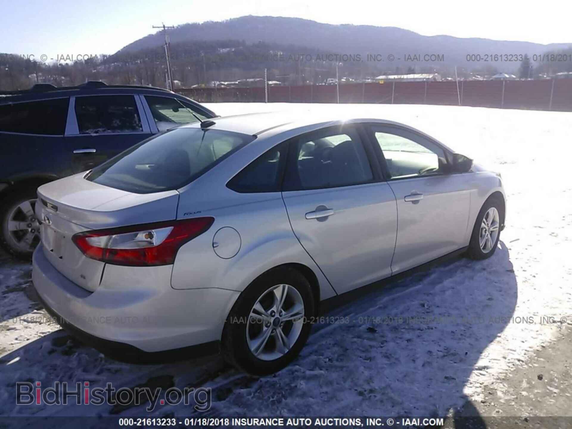 2014 Ford Focus - VIN: 1FADP3F21EL115743 - Photo 4