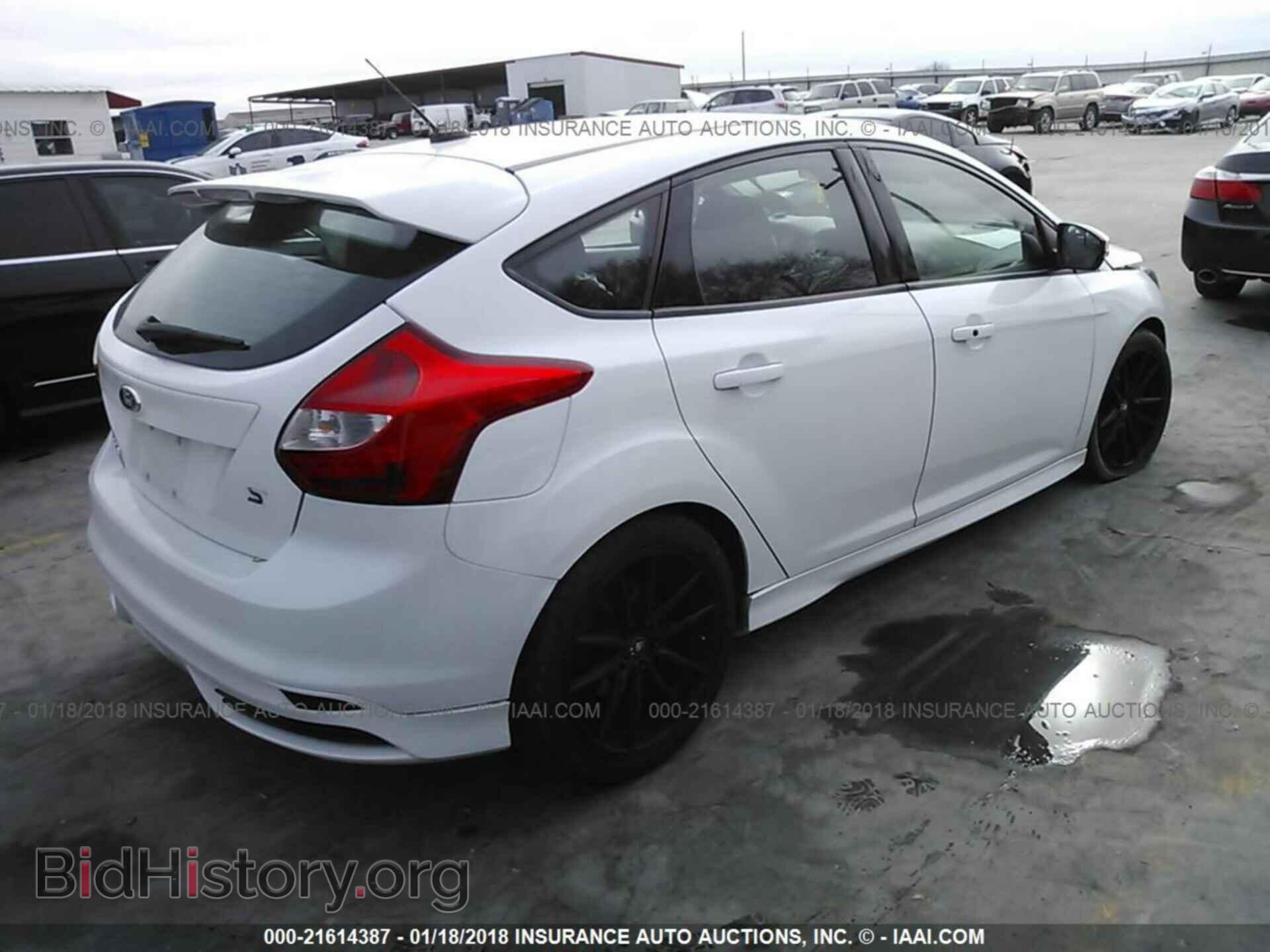 2014 Ford Focus - VIN: 1FADP3L99EL175383 - Photo 4
