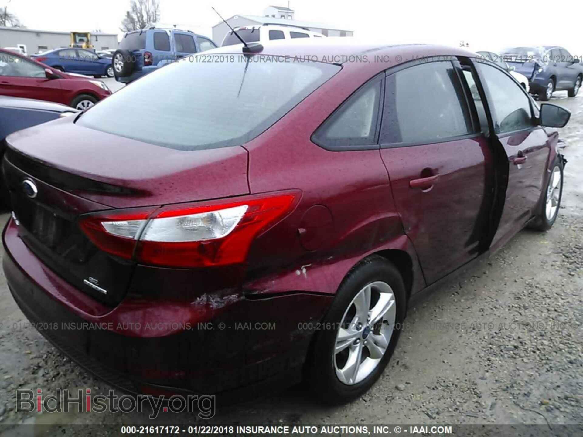 2014 Ford Focus - VIN: 1FADP3F21EL228589 - Фото 4