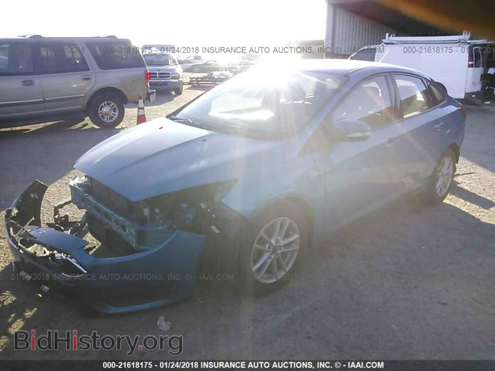 2015 Ford Focus - VIN: 1FADP3F21FL329892 - Photo 2