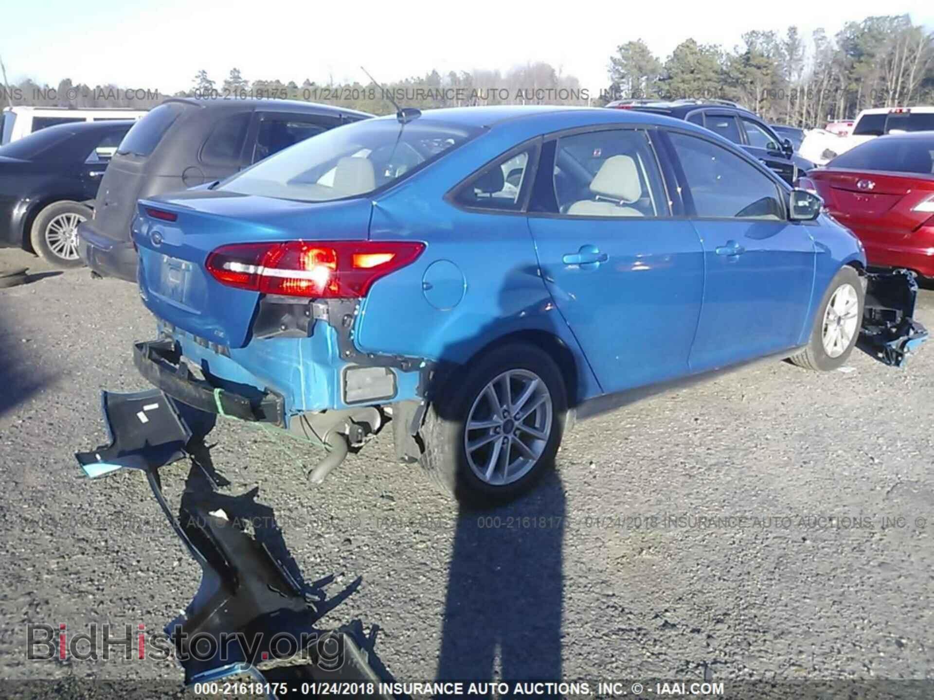 2015 Ford Focus - VIN: 1FADP3F21FL329892 - Photo 4