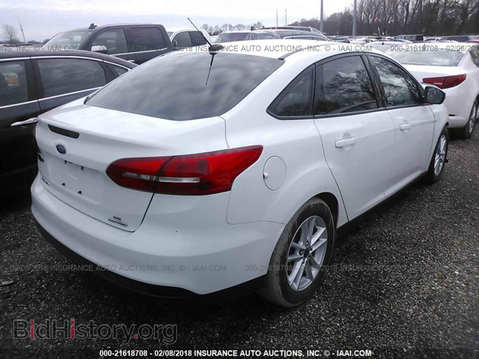 2015 Ford Focus - VIN: 1FADP3F21FL298272 - Фото 4