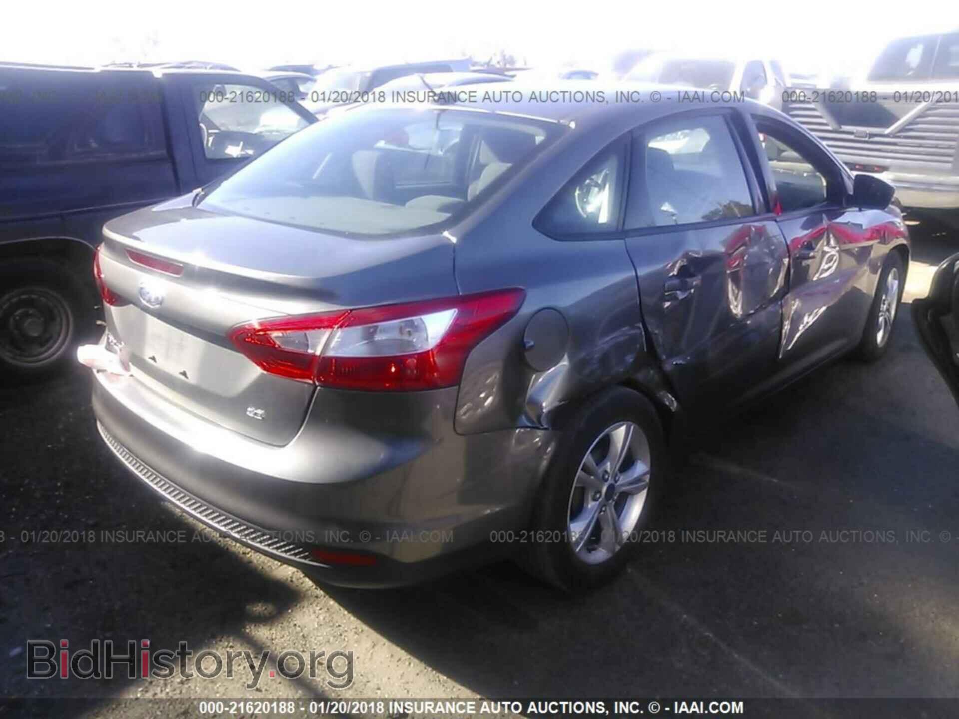 2014 Ford Focus - VIN: 1FADP3F22EL322934 - Photo 4